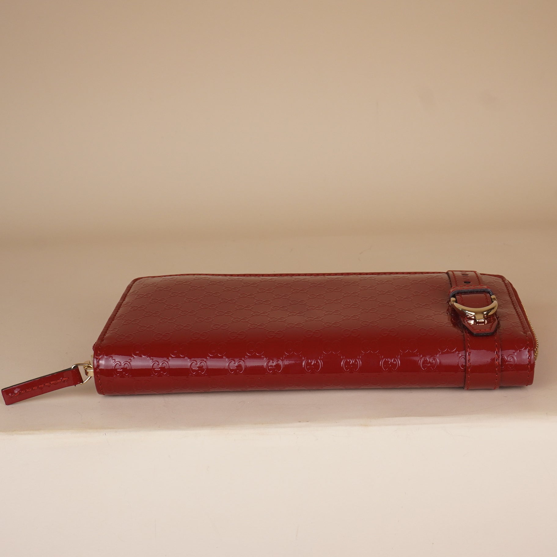 PRE-OWNED GG Microguccissima Patent Leather Stirrup Zip Around Wallet