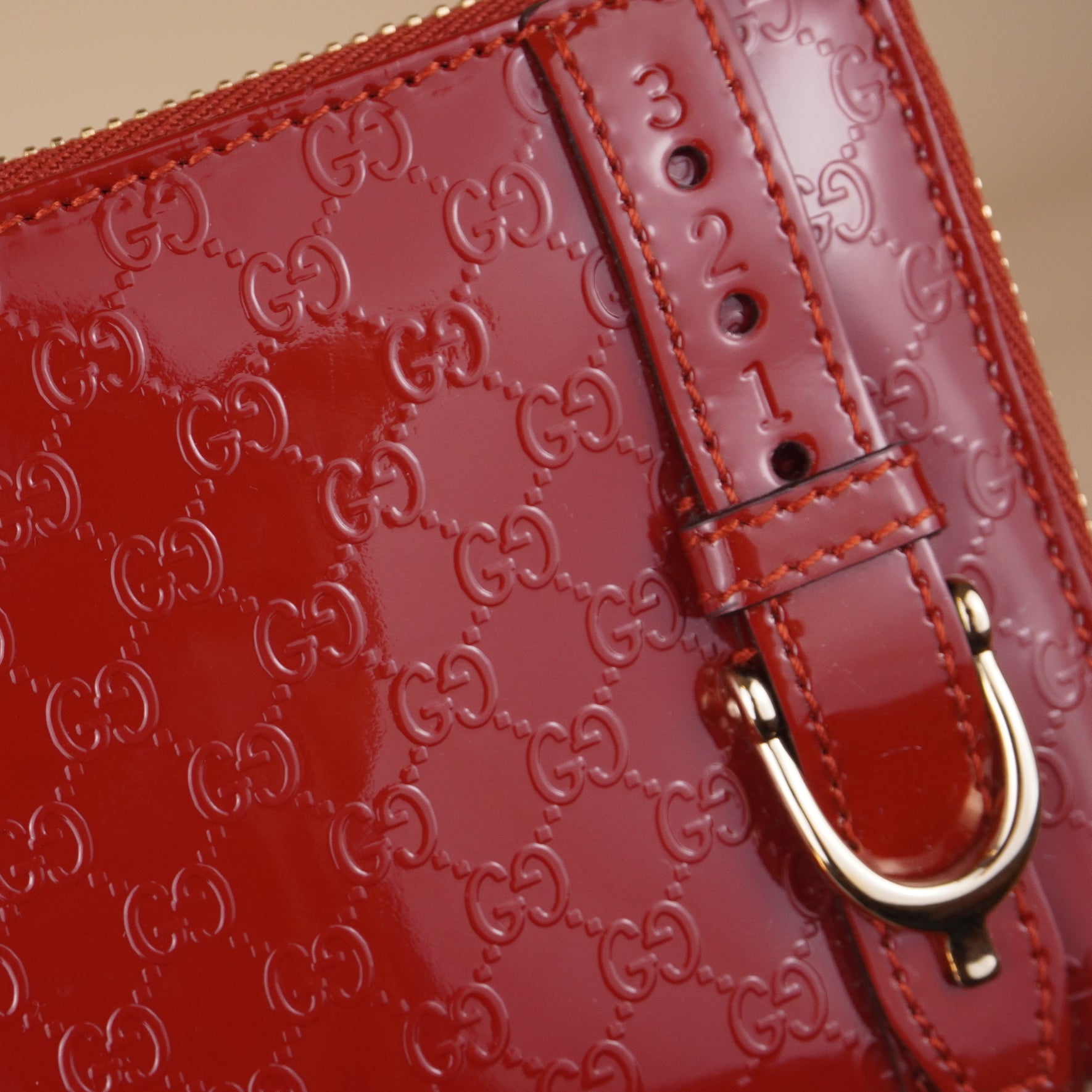 PRE-OWNED GG Microguccissima Patent Leather Stirrup Zip Around Wallet