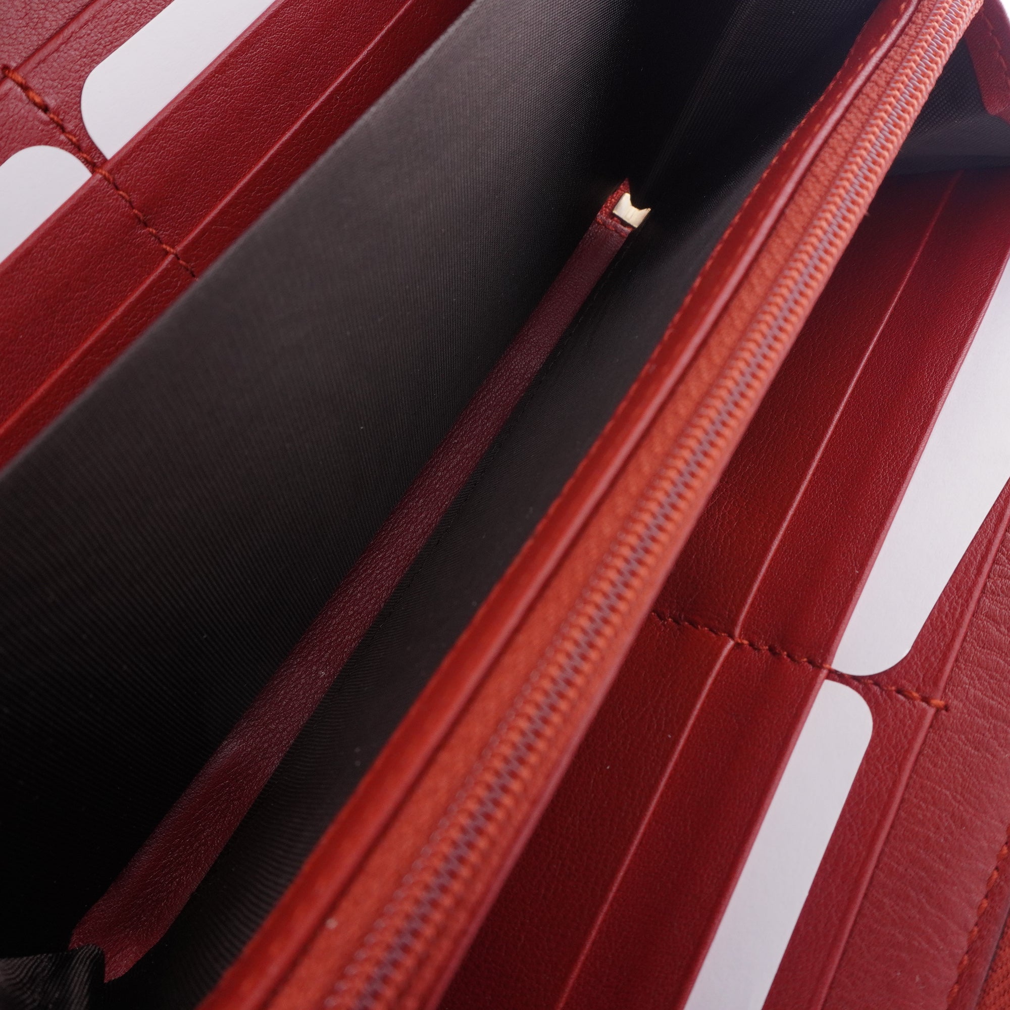 PRE-OWNED GG Microguccissima Patent Leather Stirrup Zip Around Wallet