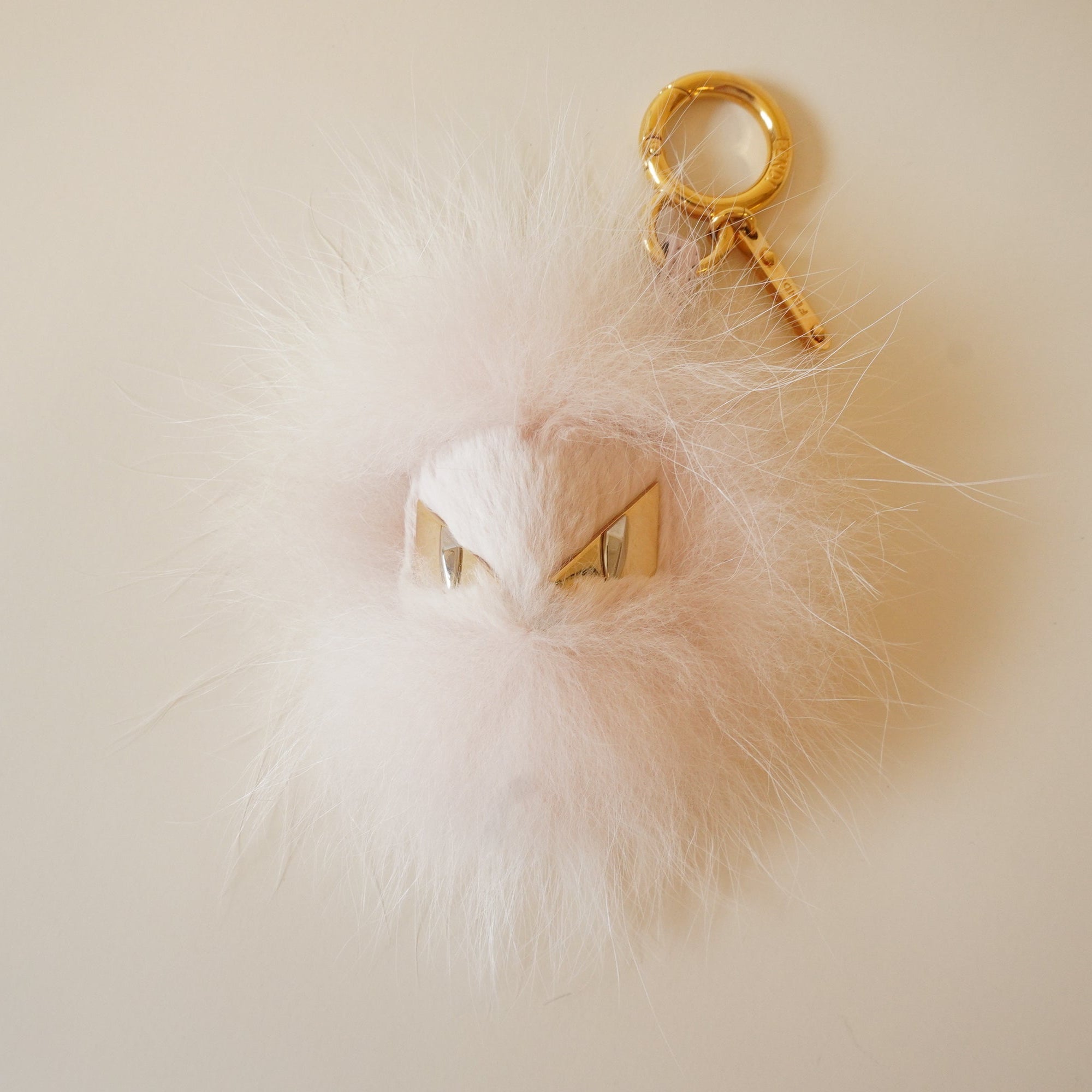 PRE-OWNED Bag Bugs Light Pink Dyed Real Fur Charm