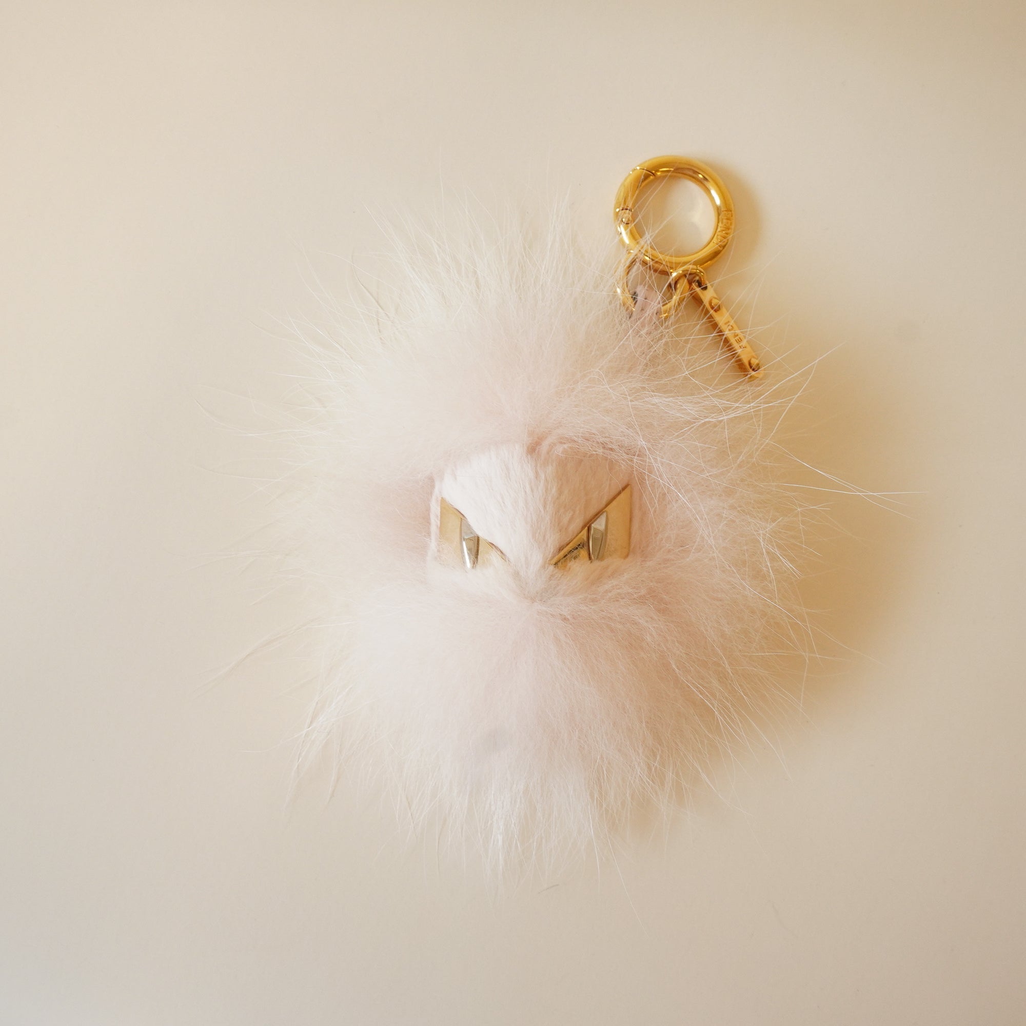 PRE-OWNED Bag Bugs Light Pink Dyed Real Fur Charm