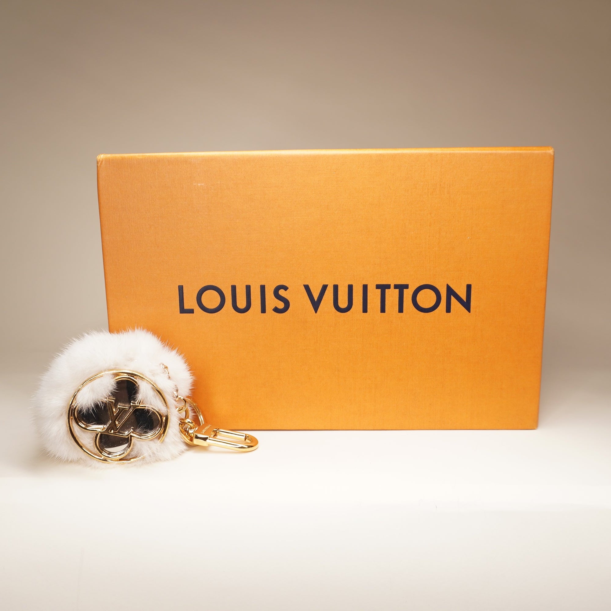 LV Keychain Golden Fur White Bag Charm 