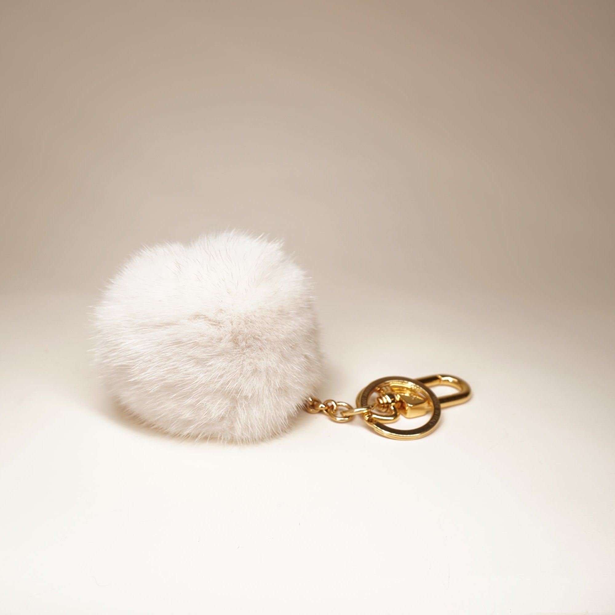 LV Keychain Golden Fur White Bag Charm 