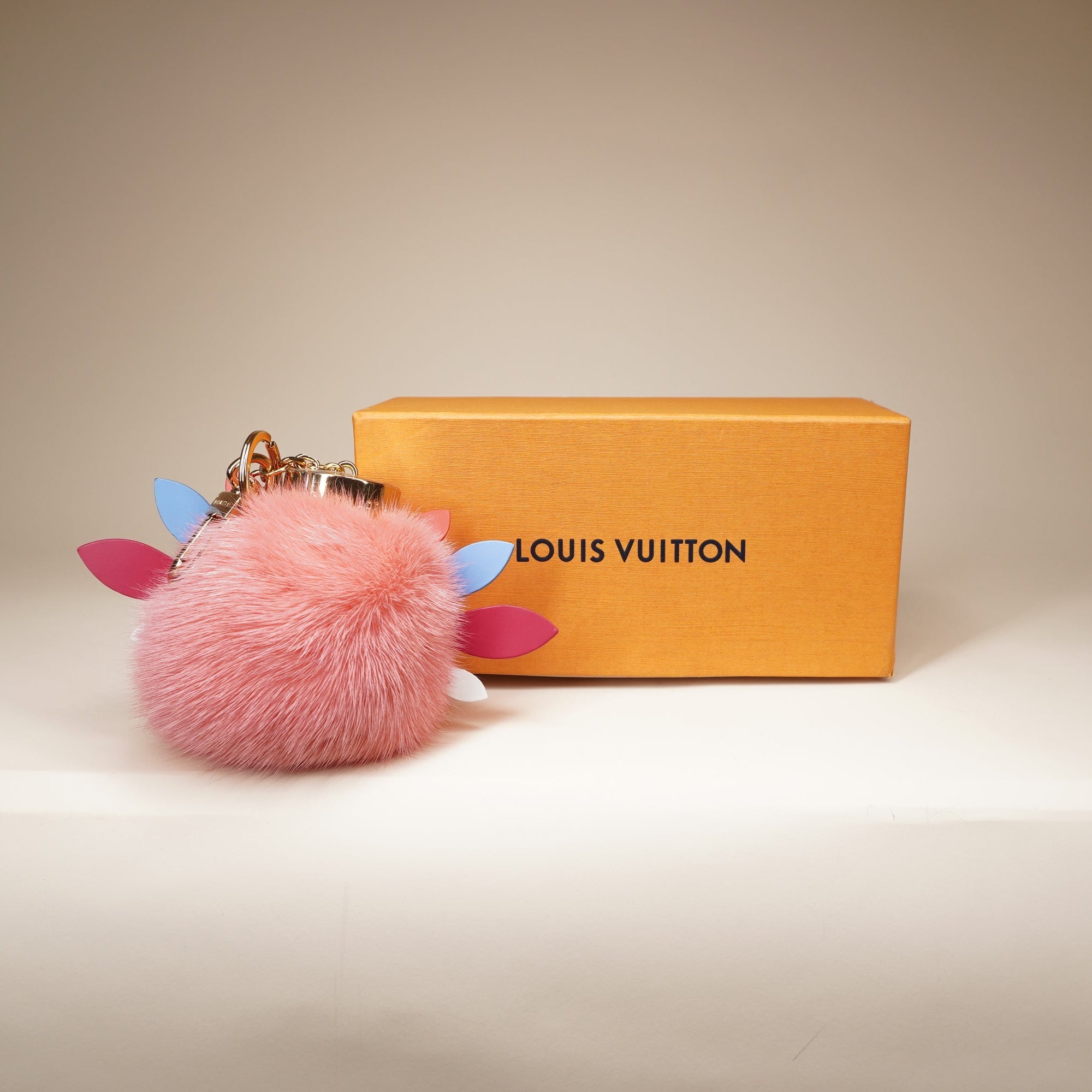 PRE-OWNED LV Pink Fur Pom Pom Bag Charm