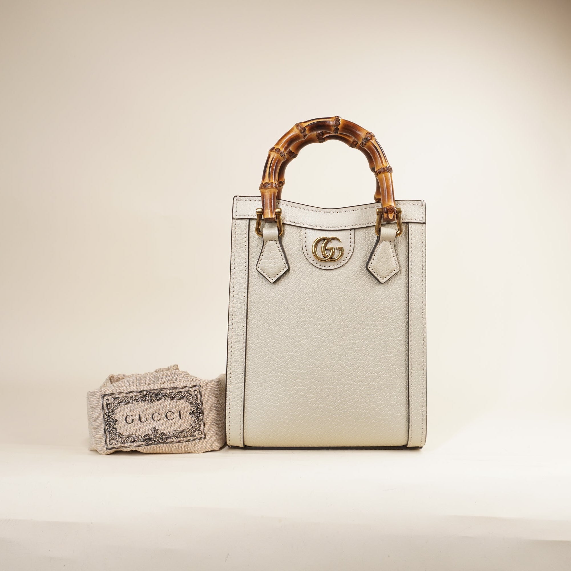 PRE-OWNED GG Cream Diana Mini Vertical Tote Shoulder Bag
