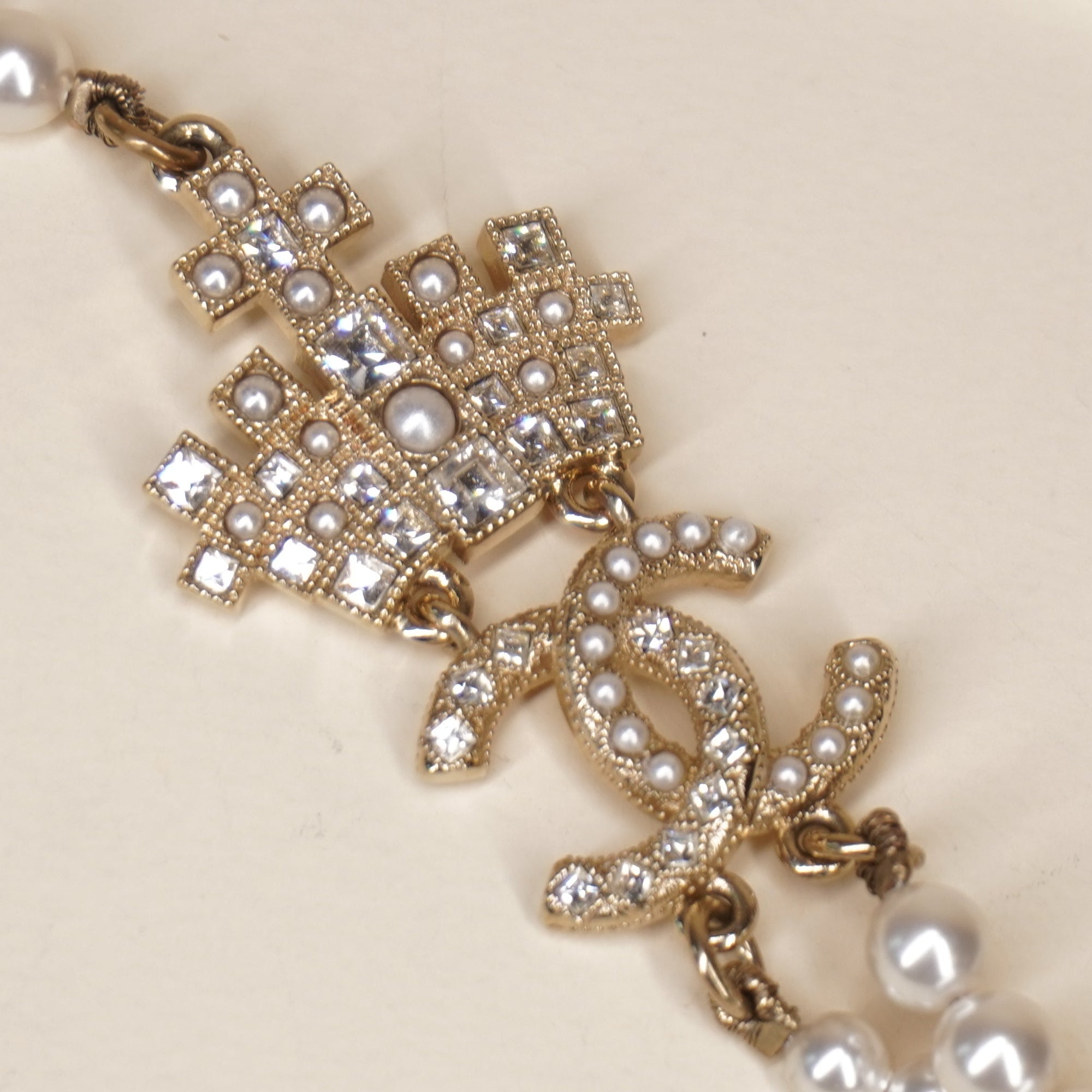 PRE-OWNED CC Pearl Necklace with Gold and Strass Crown