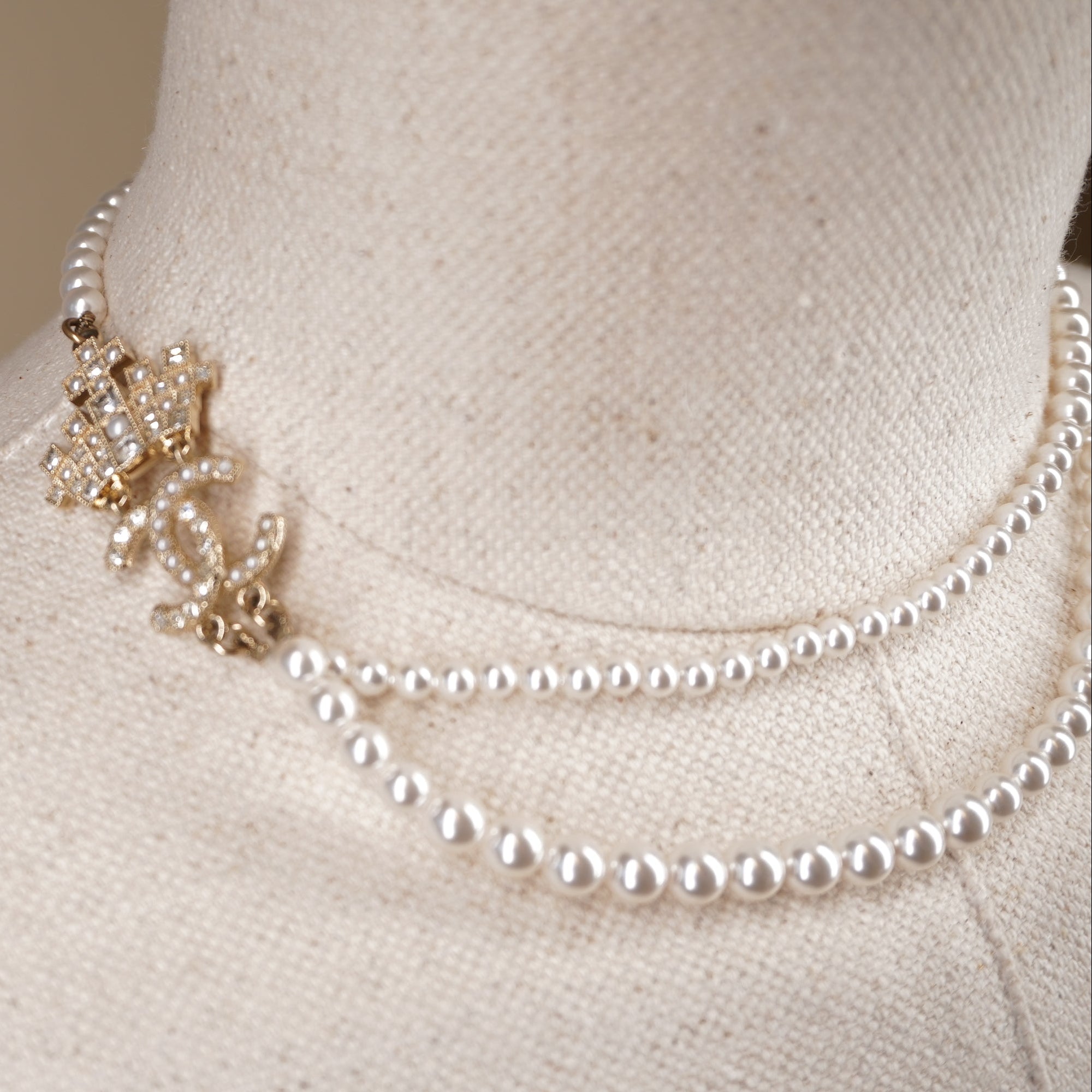 PRE-OWNED CC Pearl Necklace with Gold and Strass Crown