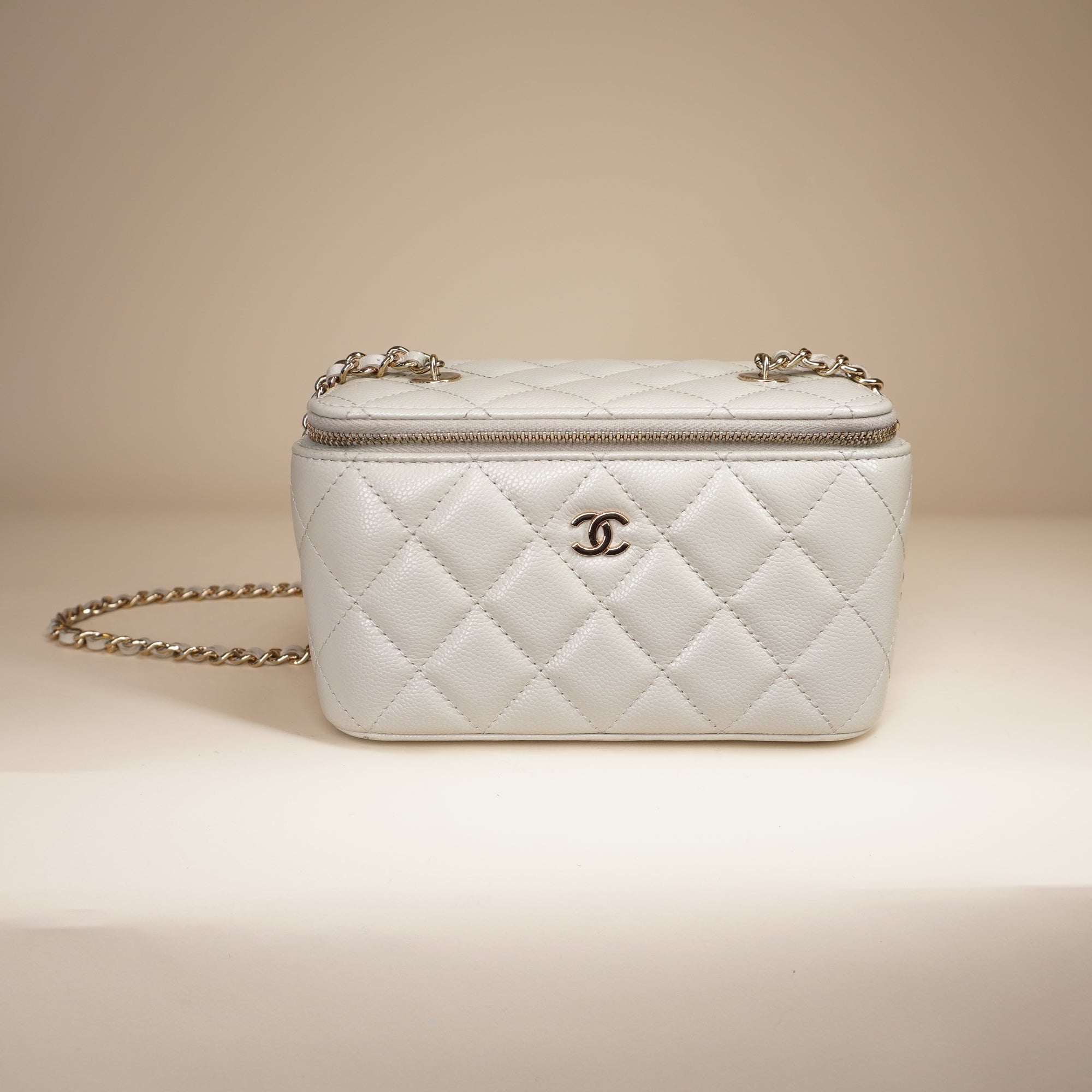 PRE-OWNED Small Vanity Case White Caviar Light Gold Hardware