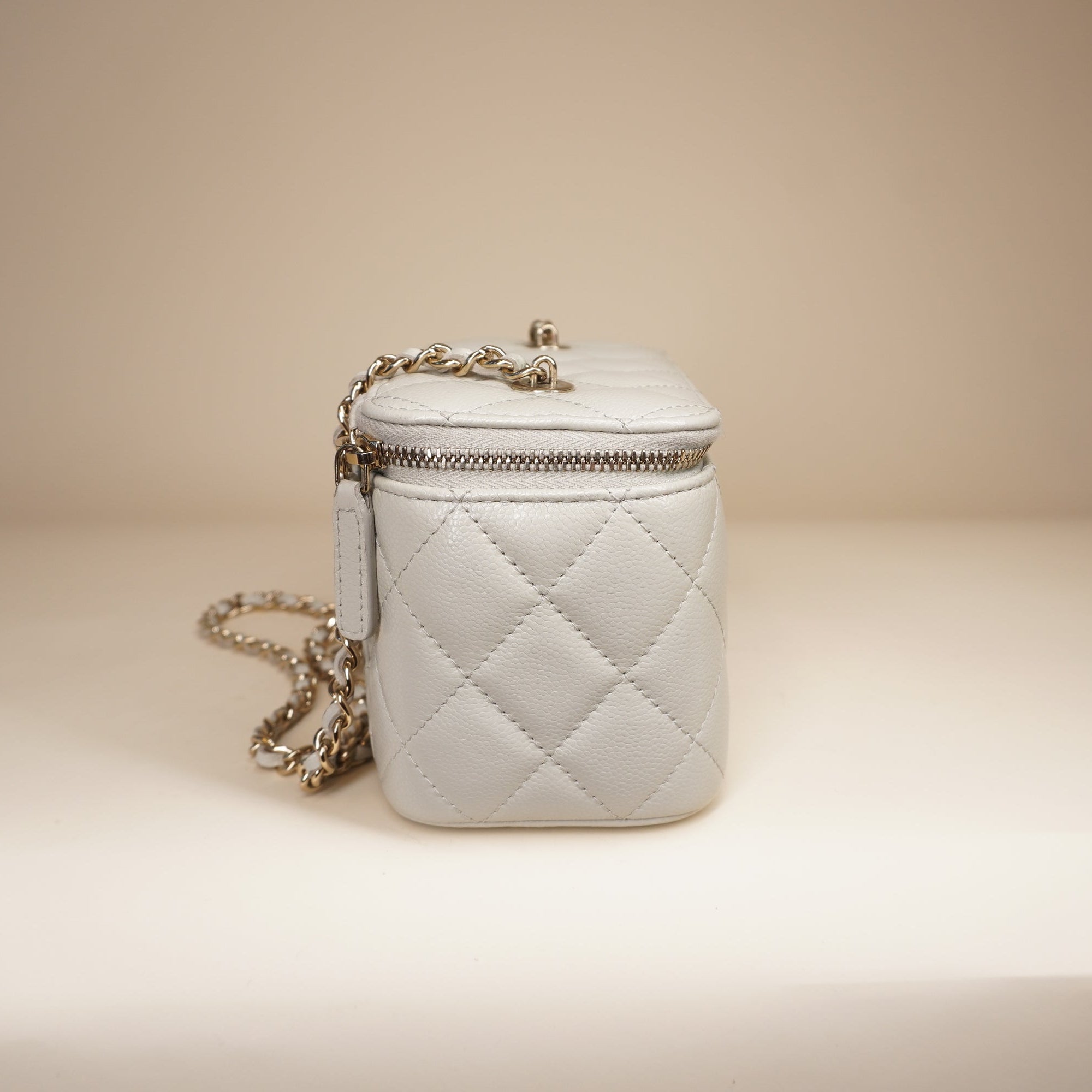 PRE-OWNED Small Vanity Case White Caviar Light Gold Hardware