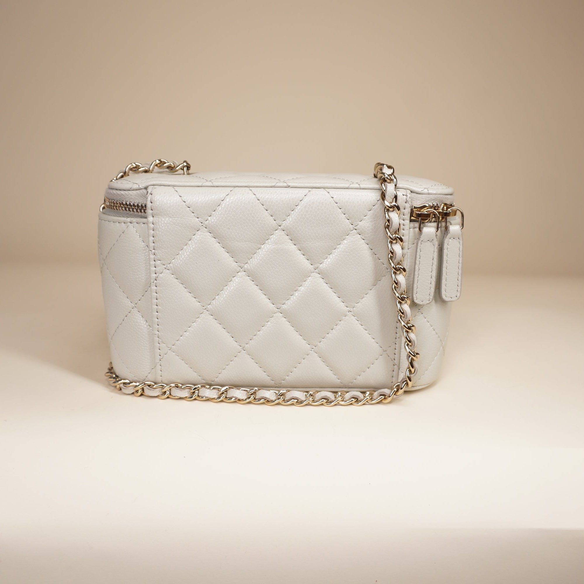 PRE-OWNED Small Vanity Case White Caviar Light Gold Hardware