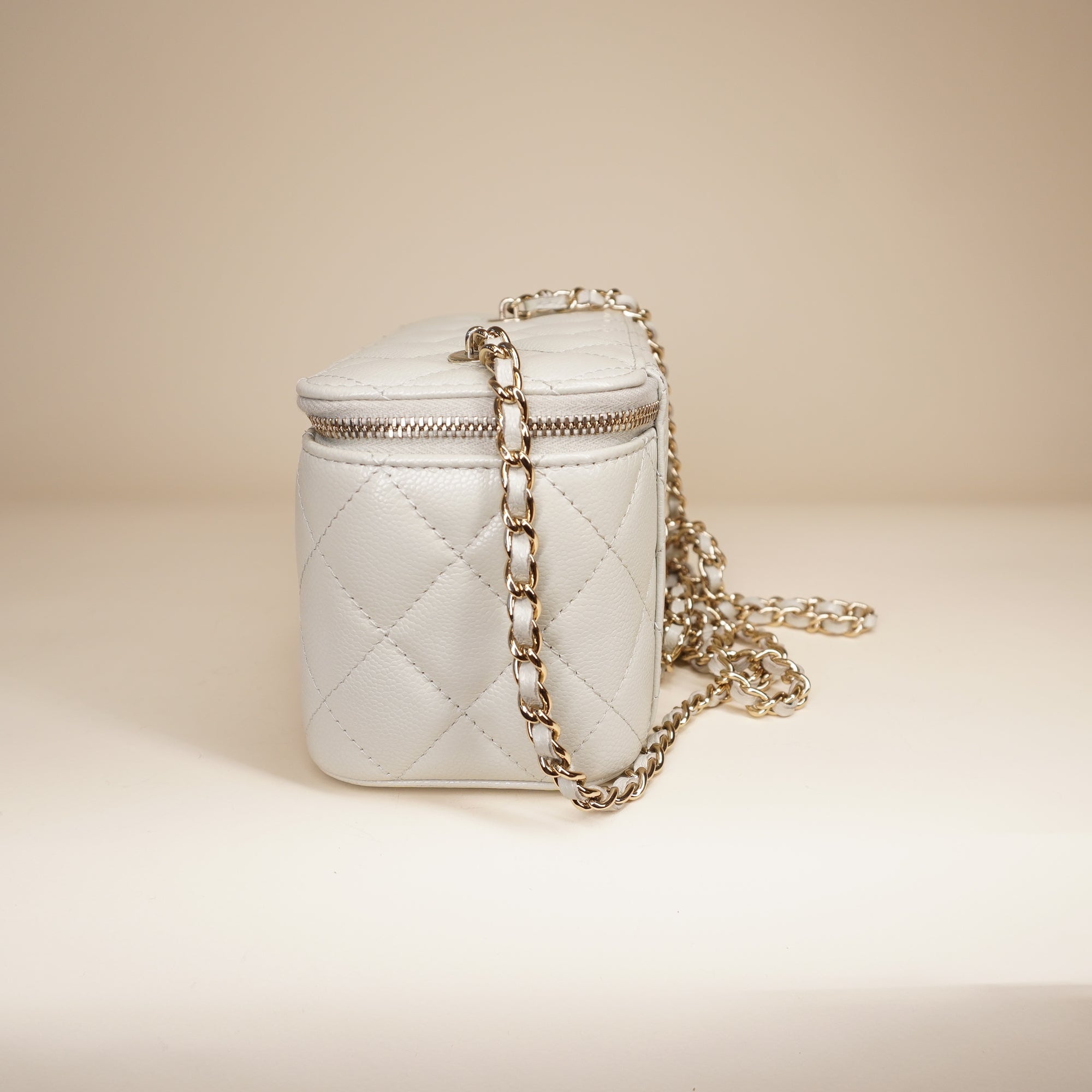 PRE-OWNED Small Vanity Case White Caviar Light Gold Hardware