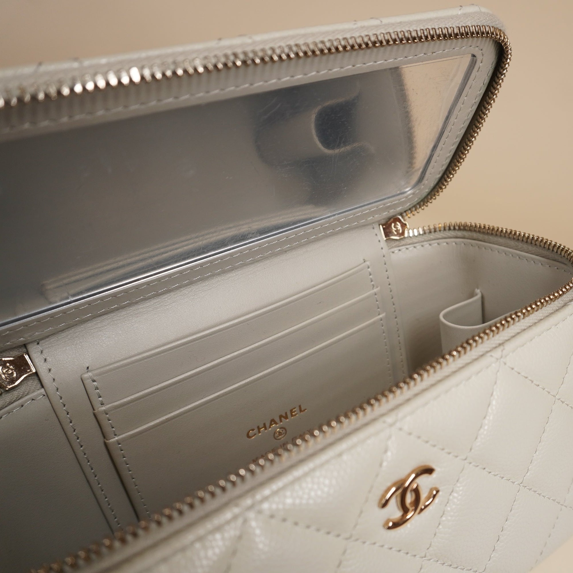 PRE-OWNED Small Vanity Case White Caviar Light Gold Hardware