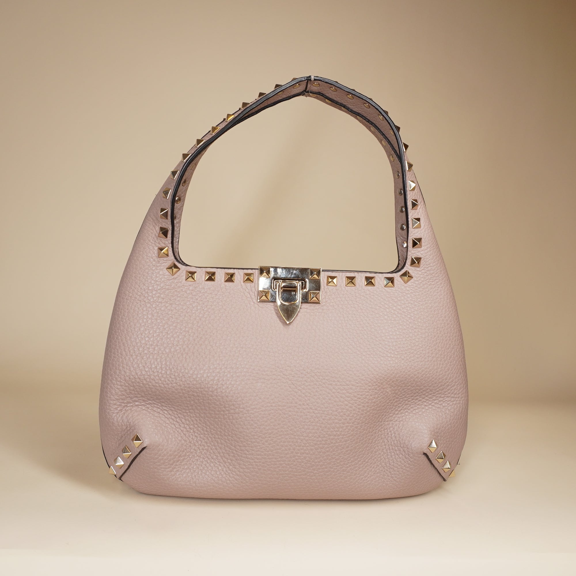 PRE-OWNED Pebbled Calfskin Small Rockstud Flip Lock Hobo Shoulder Bag