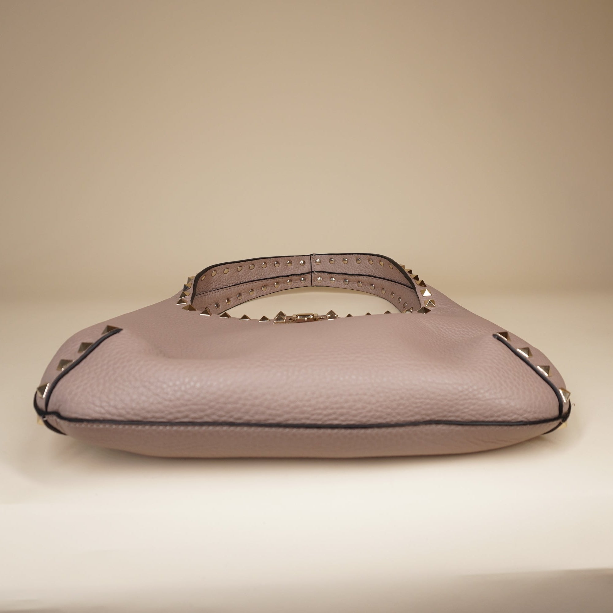 PRE-OWNED Pebbled Calfskin Small Rockstud Flip Lock Hobo Shoulder Bag