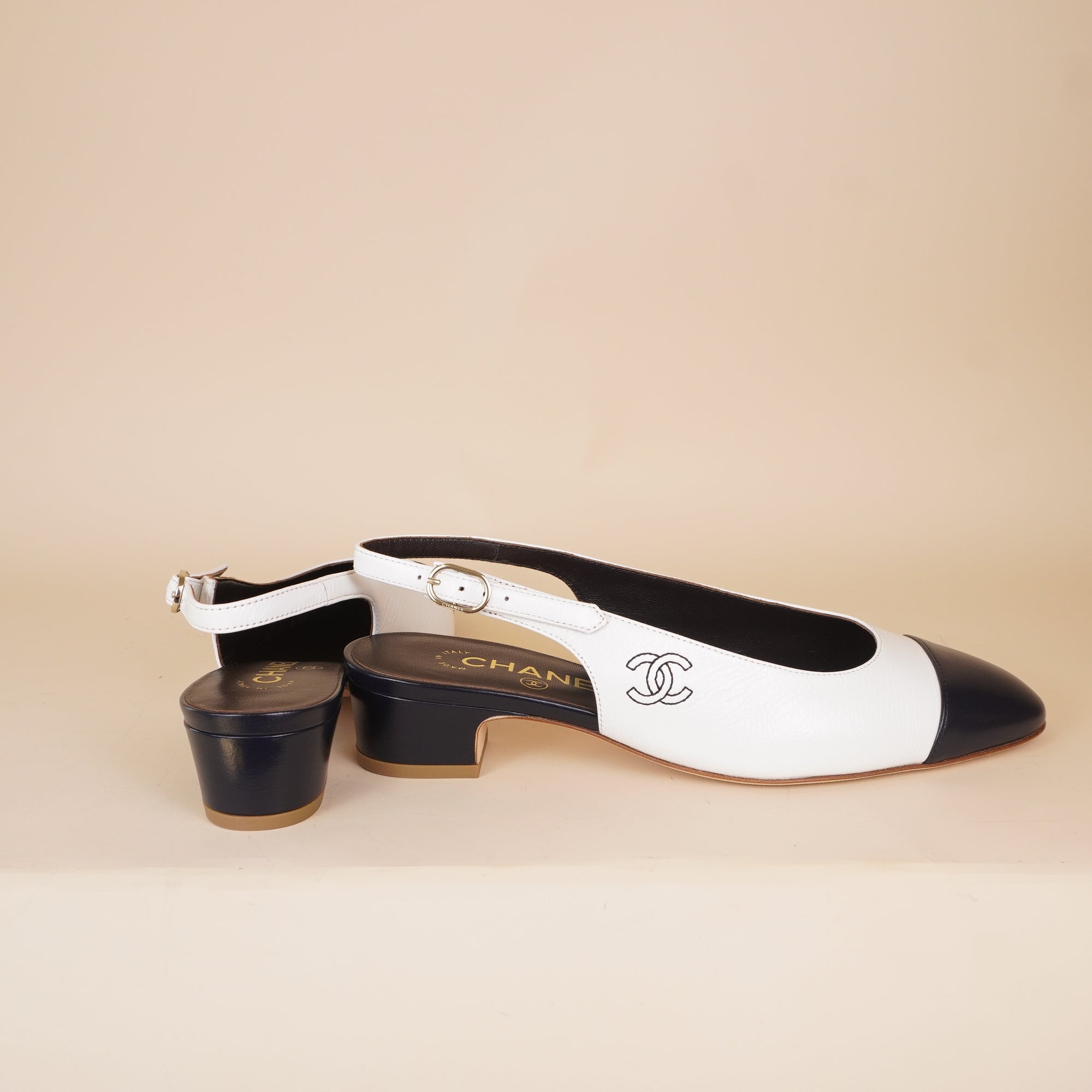 PRE-OWNED Calfskin Cap Toe CC Slingback Pumps Size 38
