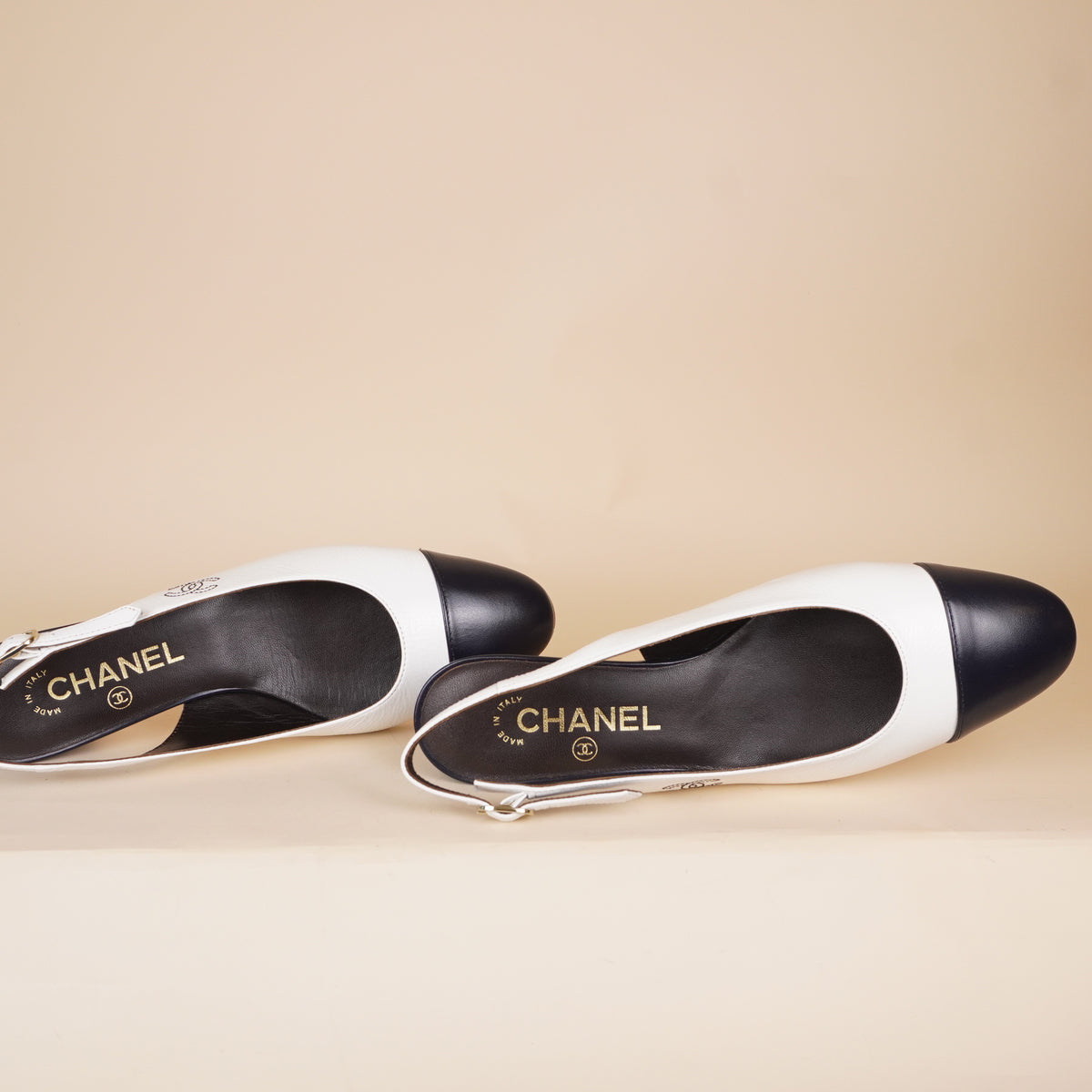 PRE-OWNED Calfskin Cap Toe CC Slingback Pumps Size 38