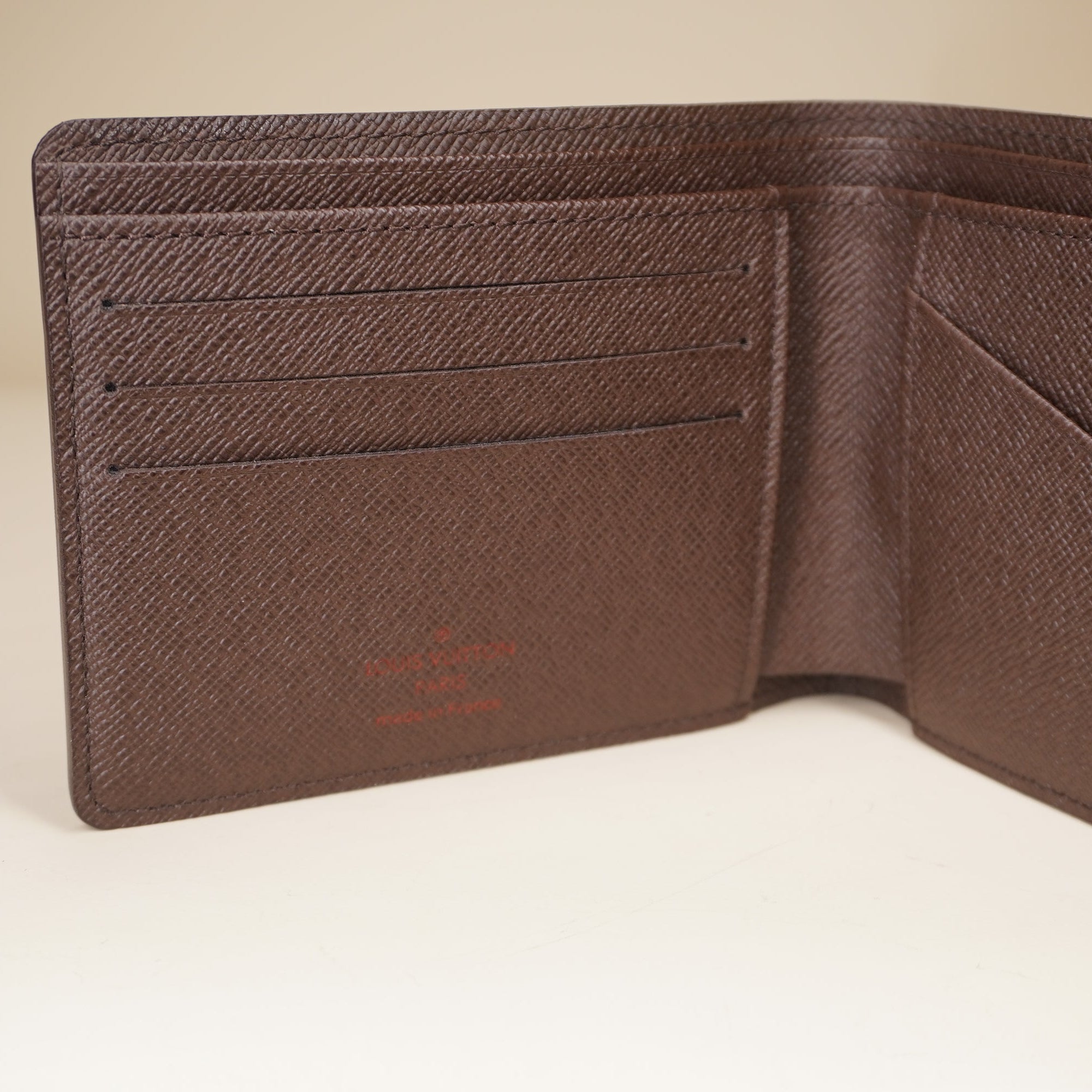 LV Multiple Wallet Damier Ebene Coated Canvas