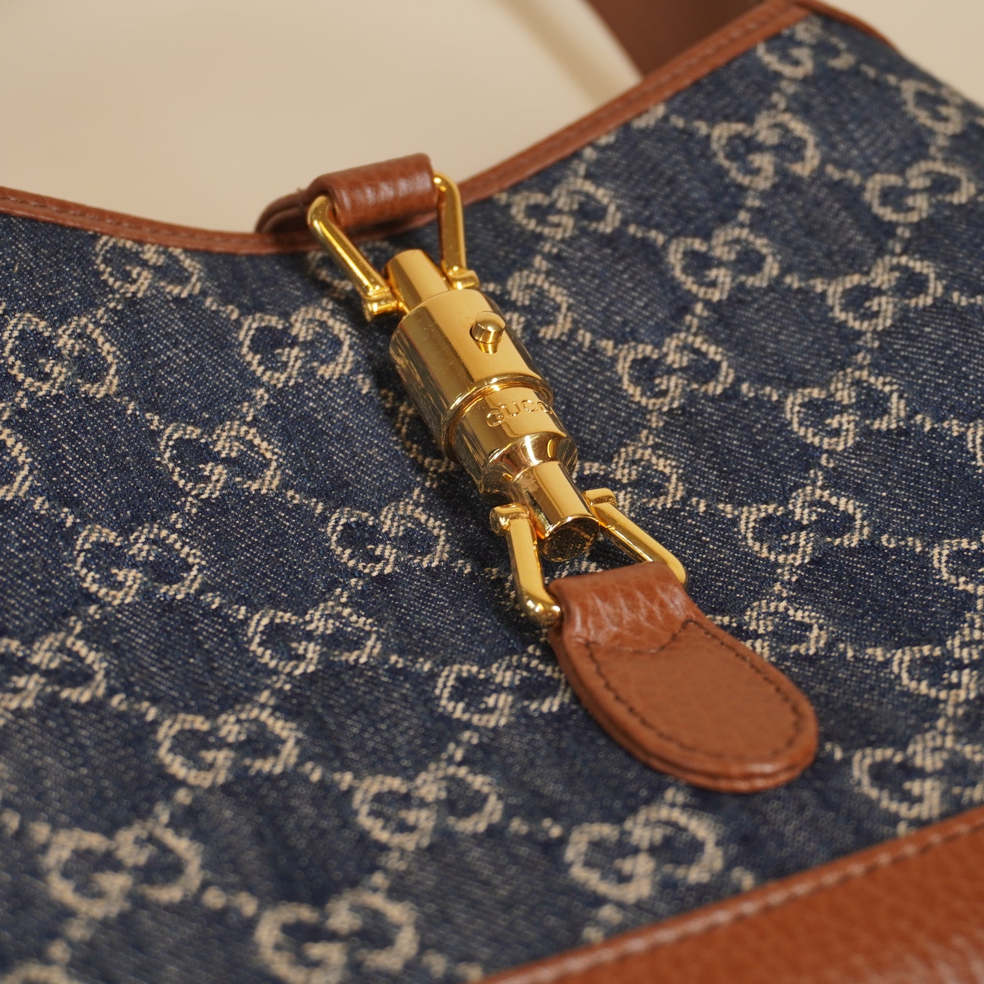 PRE-OWNED Monogram Calfskin Small Jackie Hobo 1961 Denim Shoulder Bag