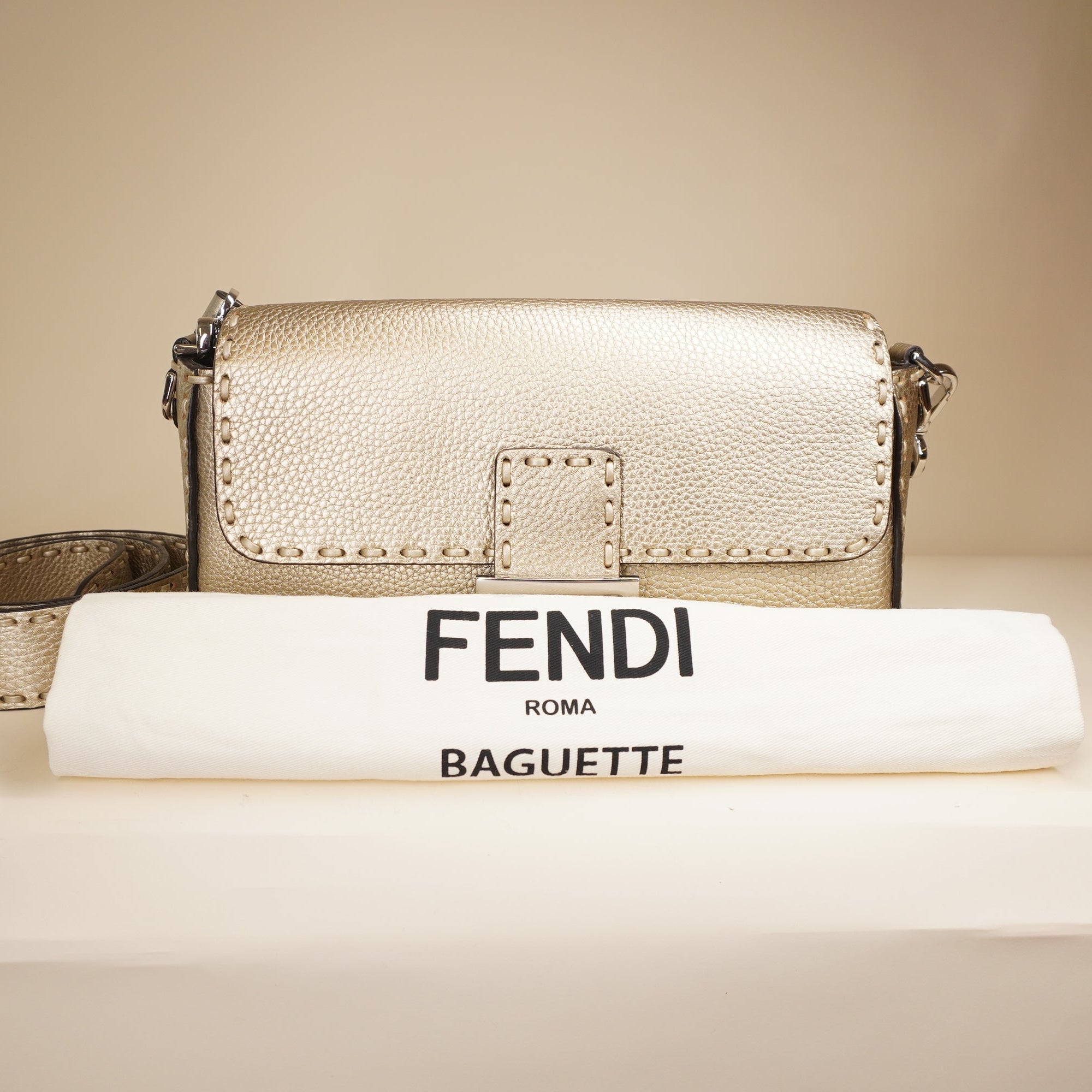 PRE-OWNED Gold Baguette Selleria Shoulder Bag