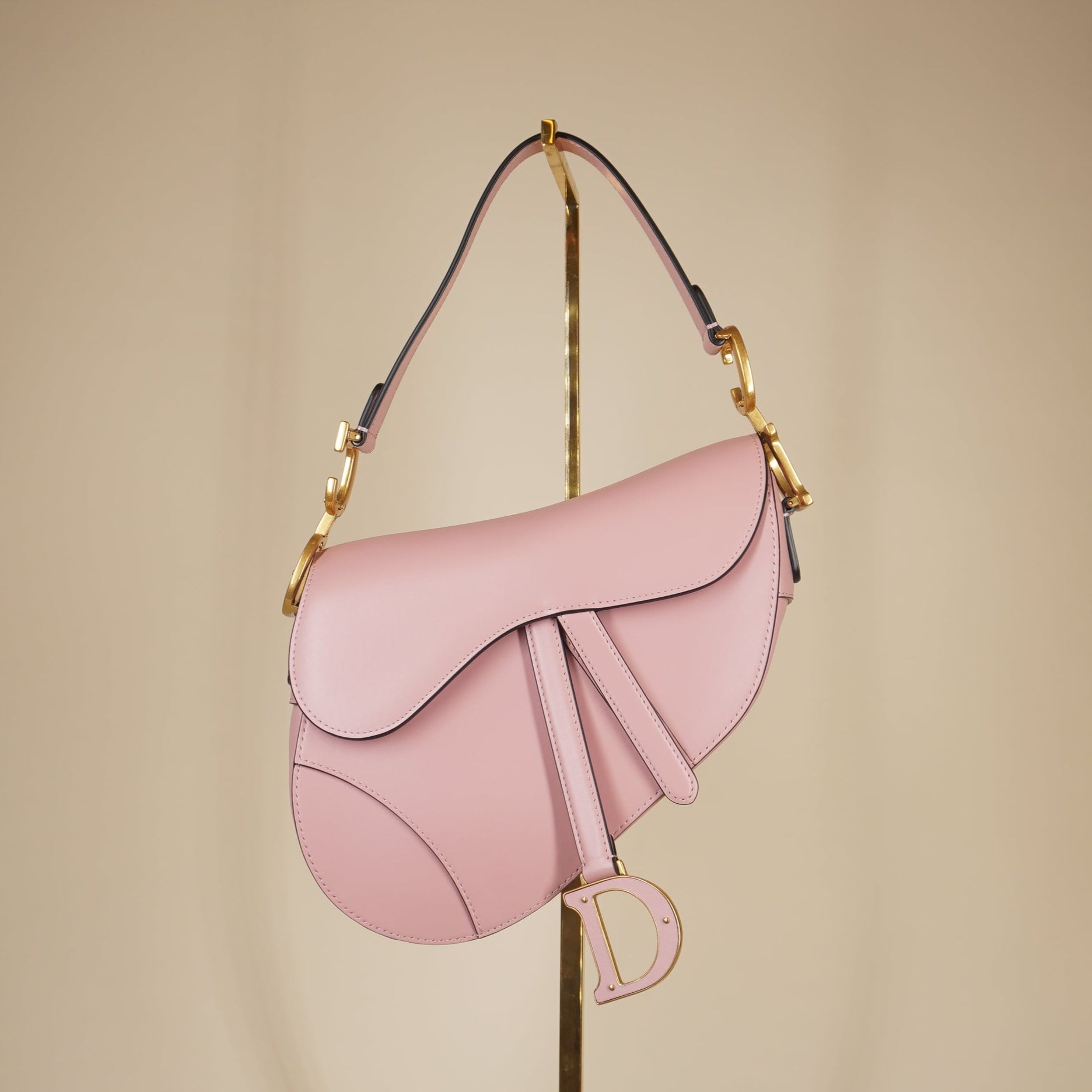 PRE-OWNED Smooth Calfskin Saddle Bag With Strap Antique Pink