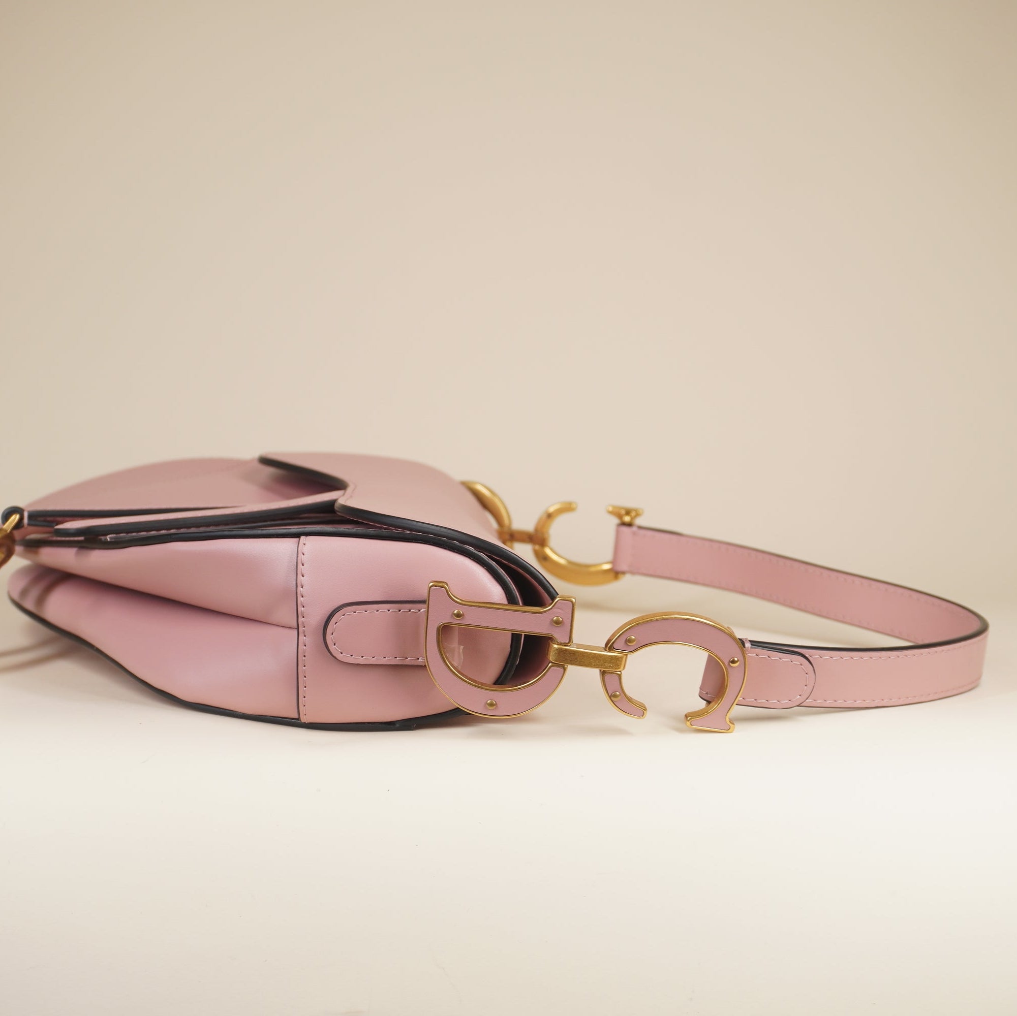 PRE-OWNED Smooth Calfskin Saddle Bag With Strap Antique Pink