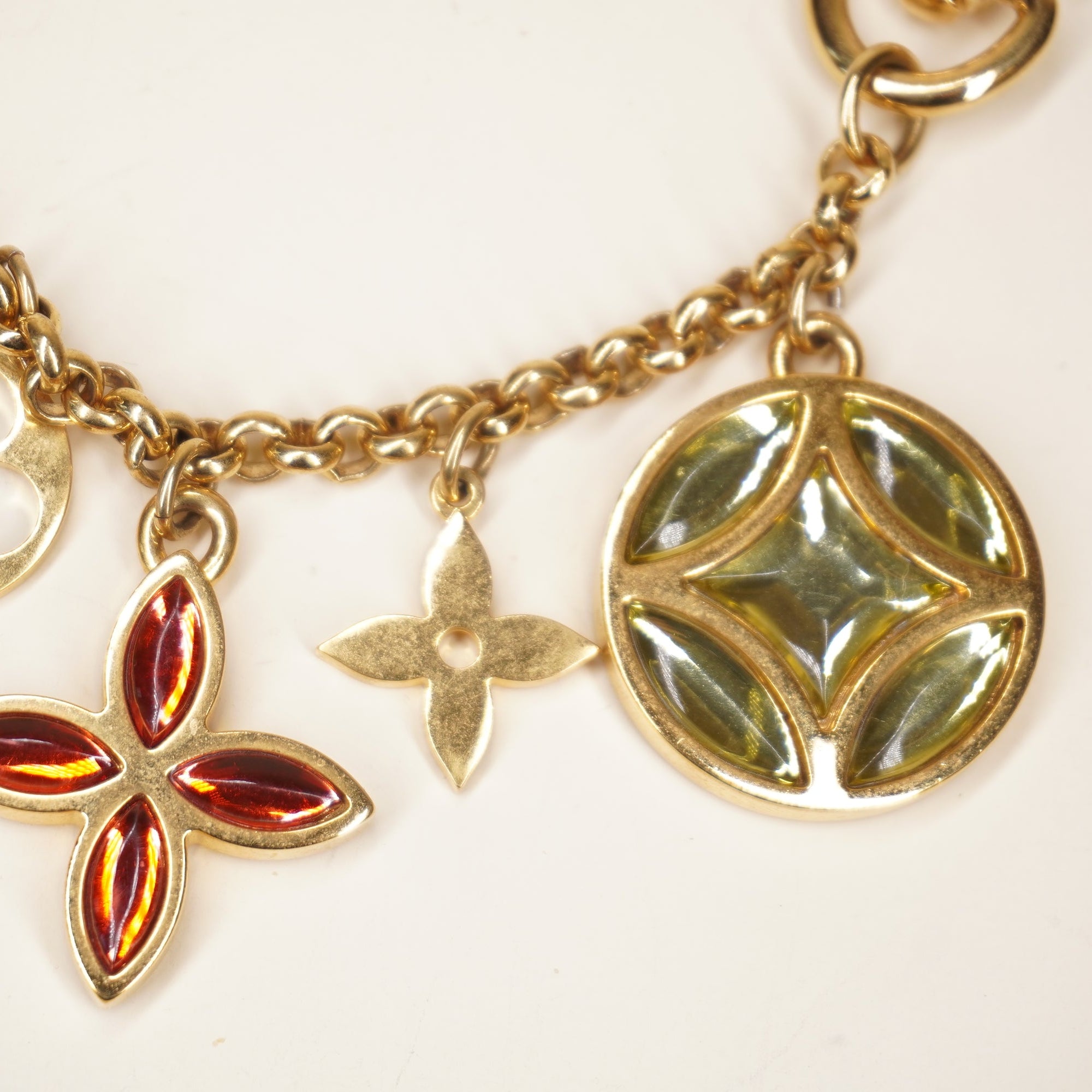 PRE-OWNED LV Gold Metal Ice Flower Bag Charm