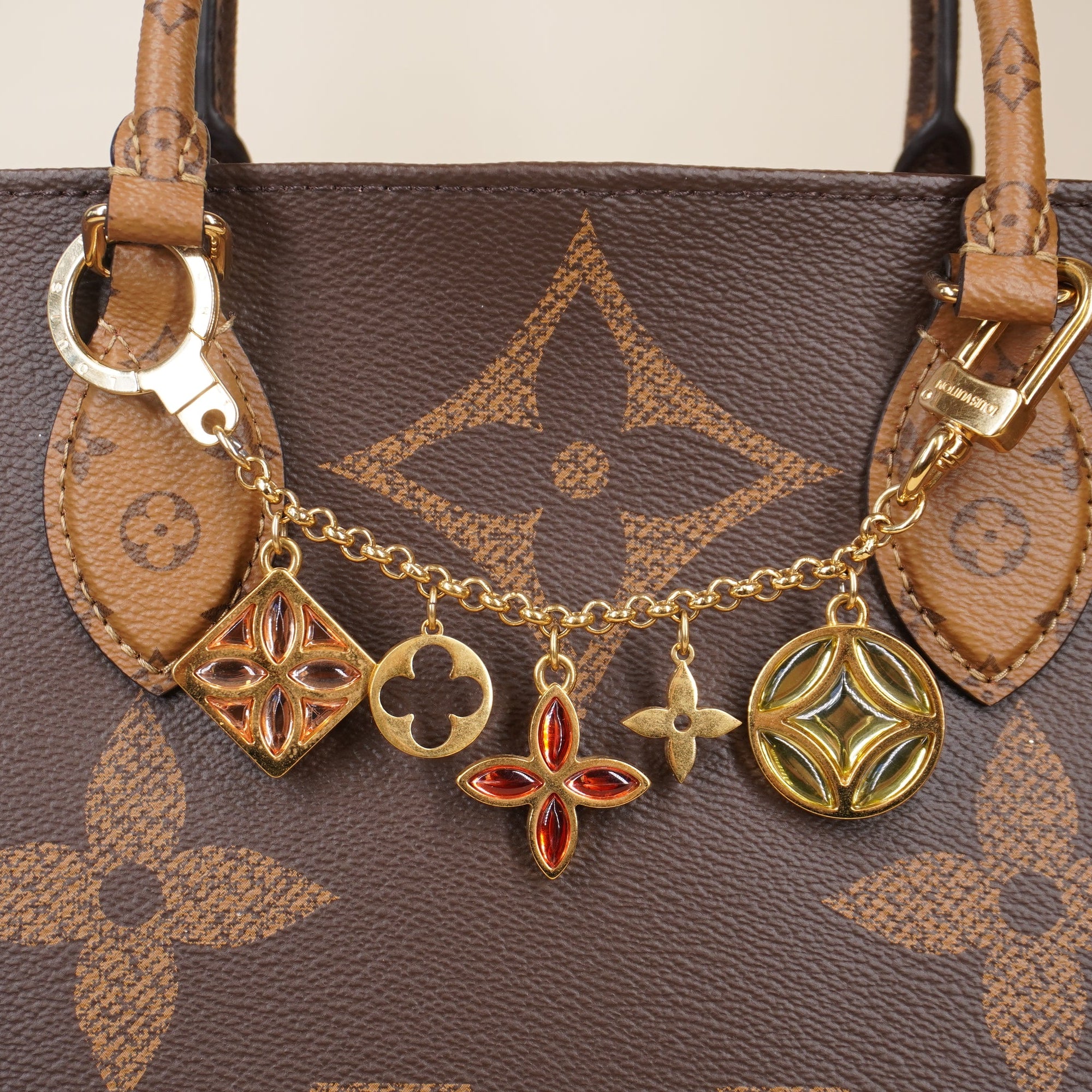 PRE-OWNED LV Gold Metal Ice Flower Bag Charm