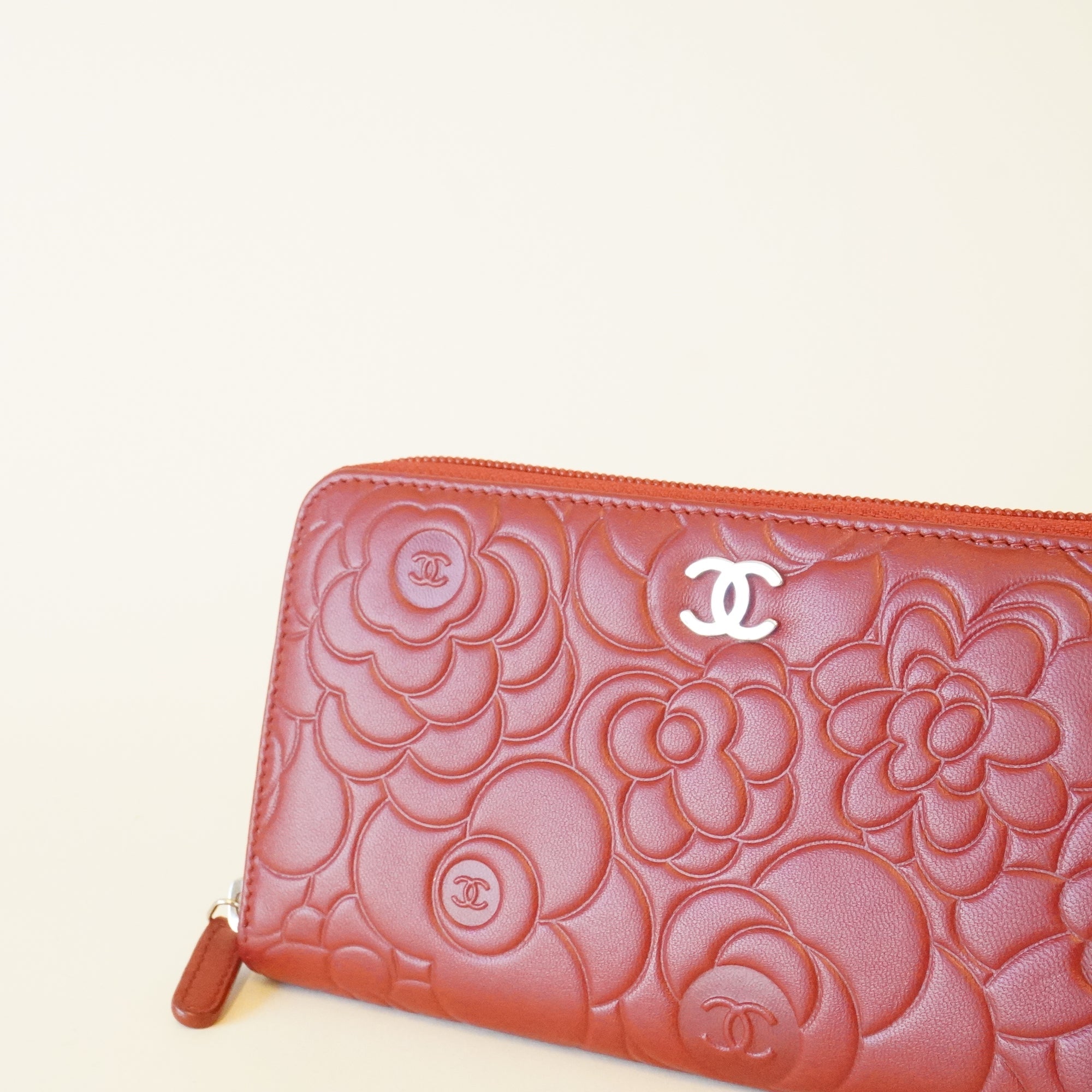 PRE-OWNED CC Red Caviar Leather Camellia Embossed Zip Around Long Wallet