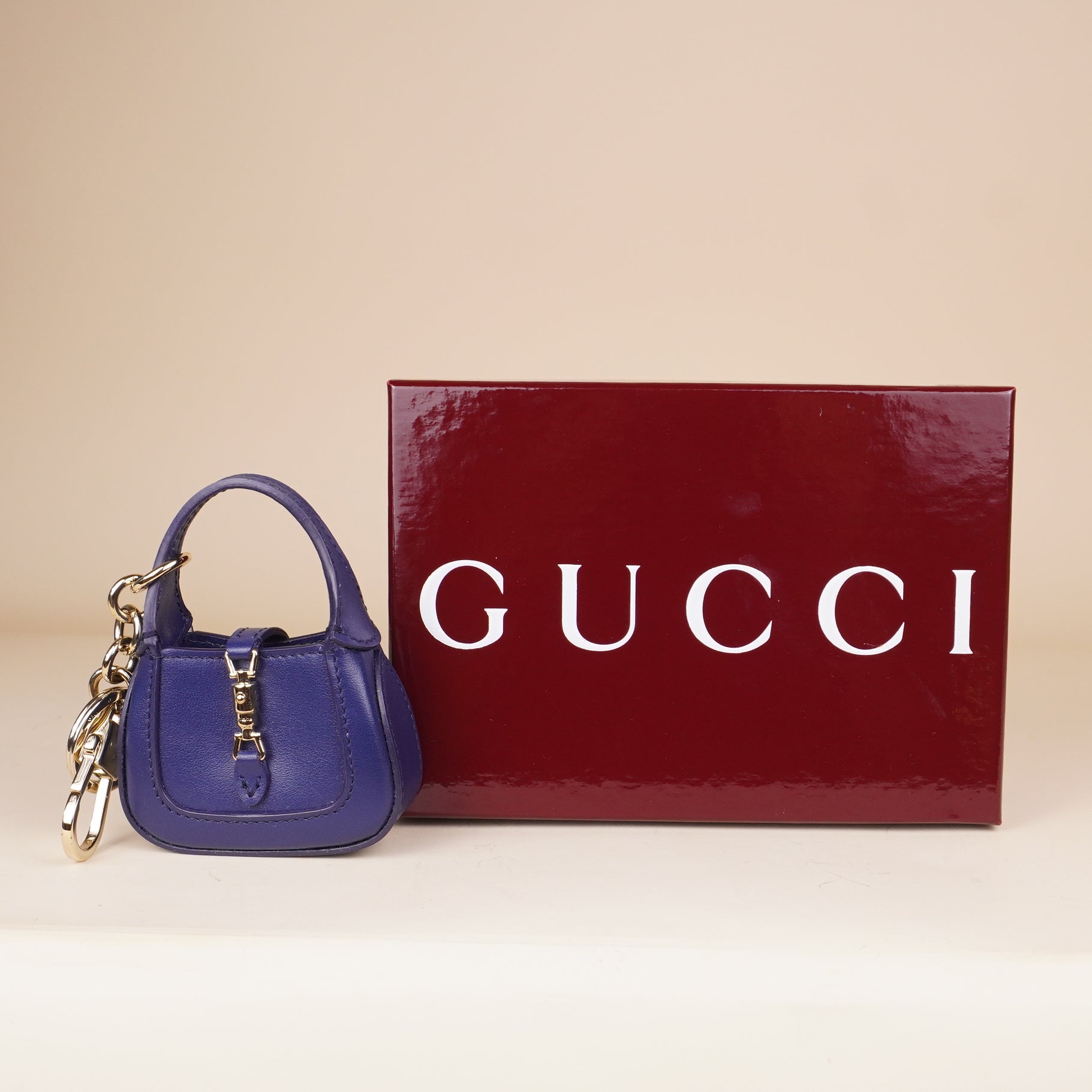 PRE-OWNED GG Boarded Dyana Lux Calfskin Small Jackie 1961 Hobo New Cherry Red with Blue Jackie Charm