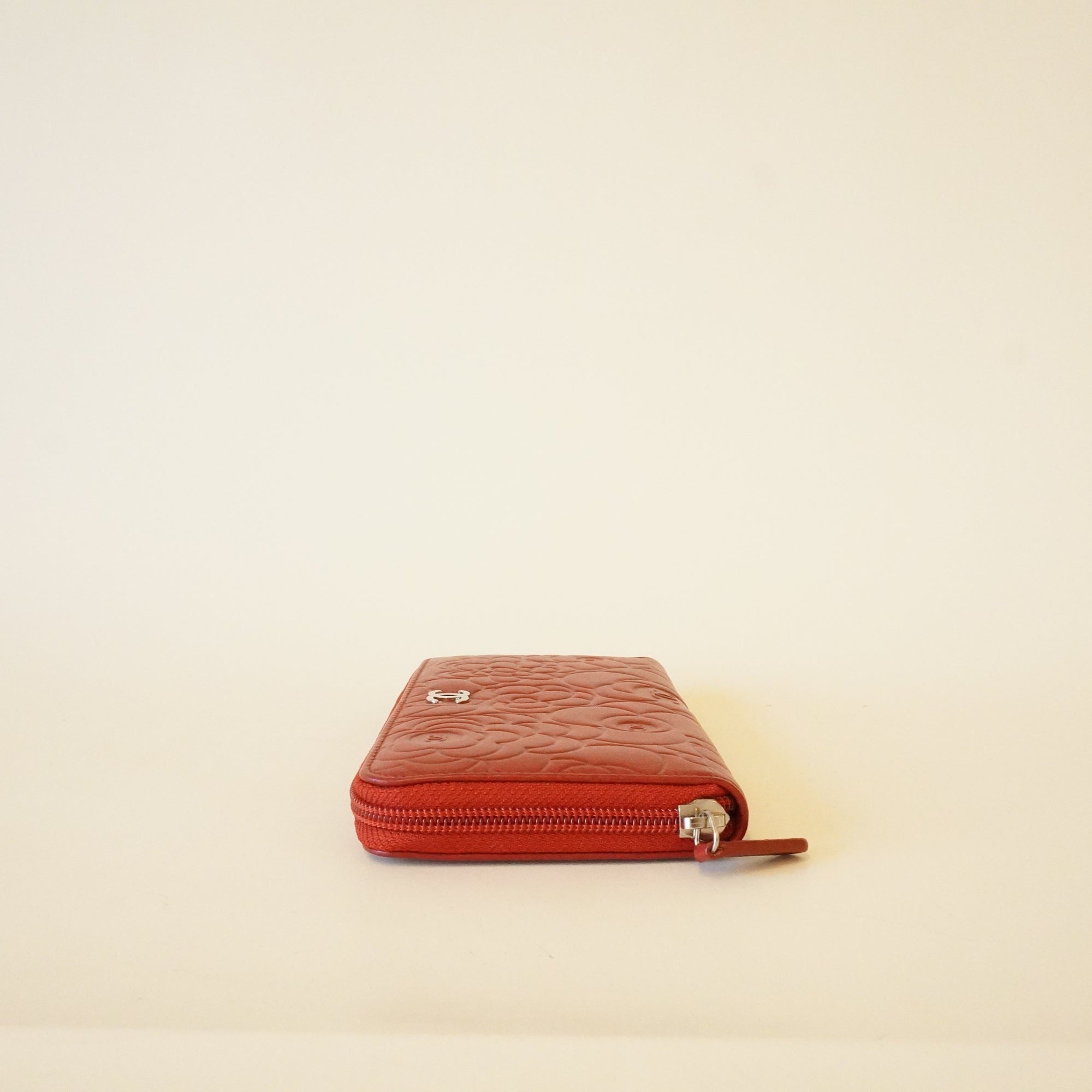 PRE-OWNED CC Red Caviar Leather Camellia Embossed Zip Around Long Wallet
