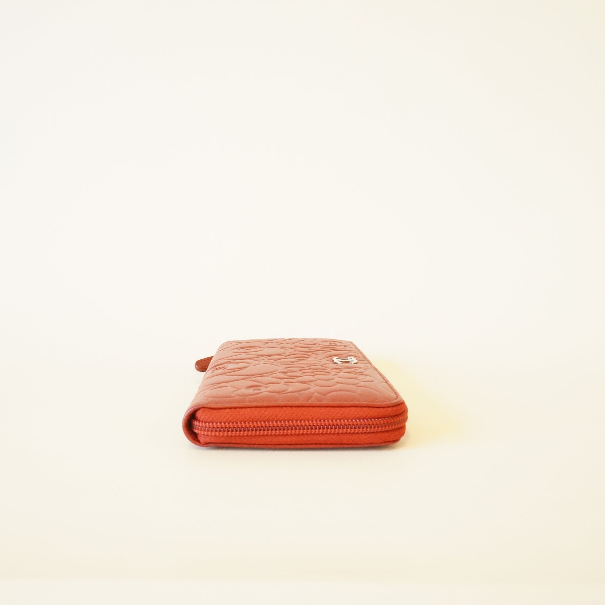 PRE-OWNED CC Red Caviar Leather Camellia Embossed Zip Around Long Wallet