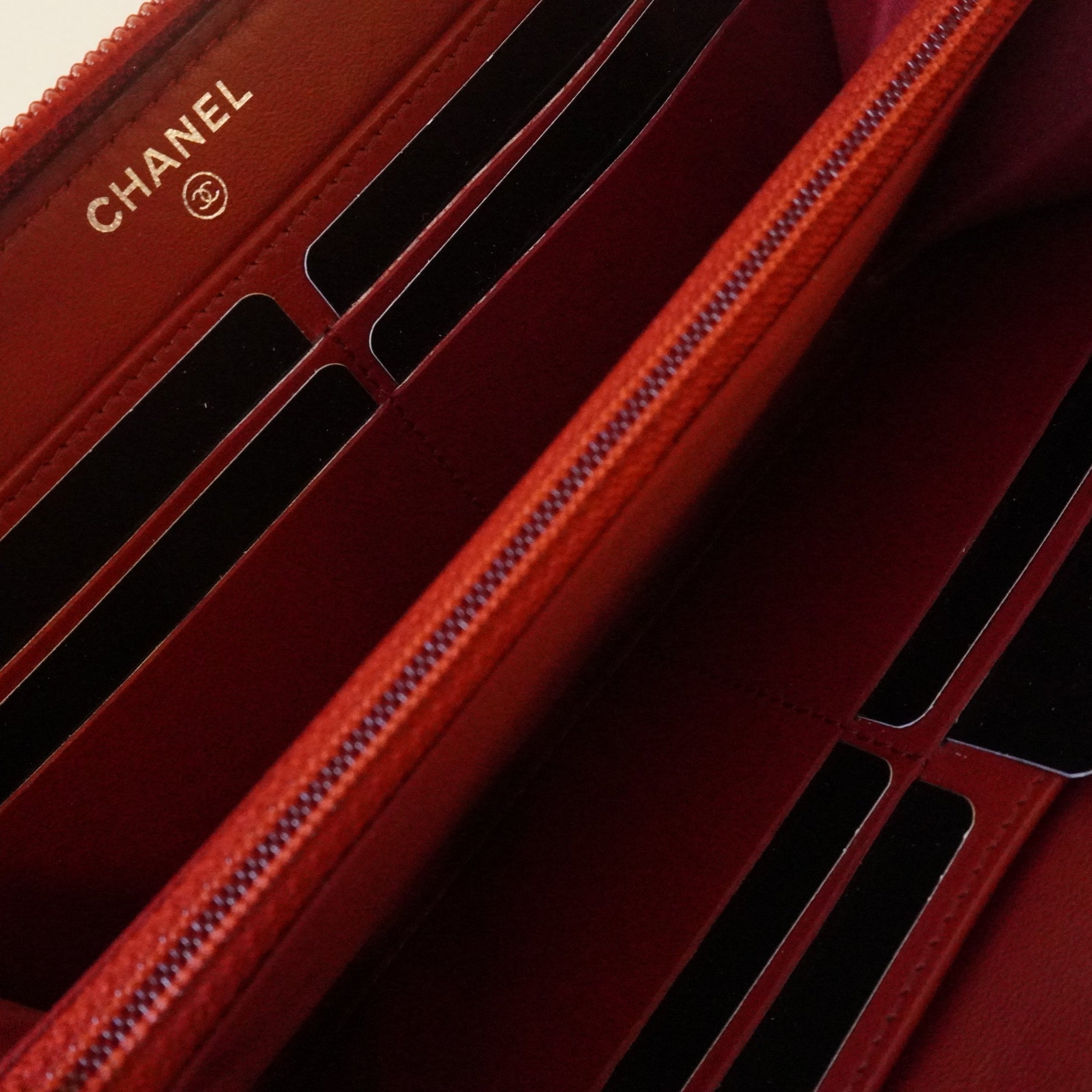PRE-OWNED CC Red Caviar Leather Camellia Embossed Zip Around Long Wallet