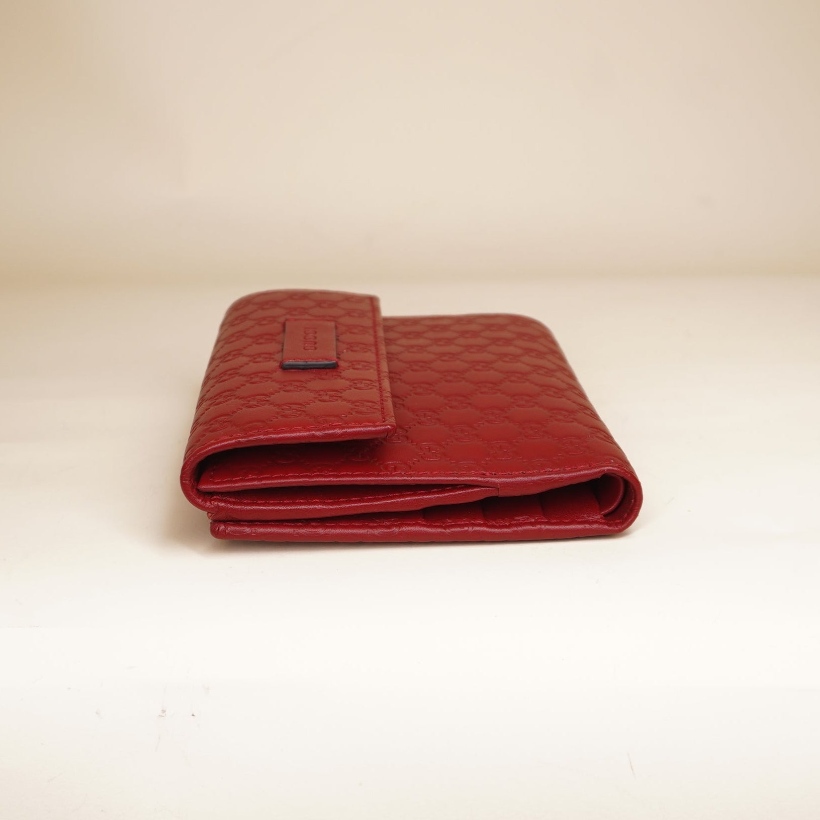 PRE-OWNED GG Microguccissima Red Leather Bi-Fold Wallet