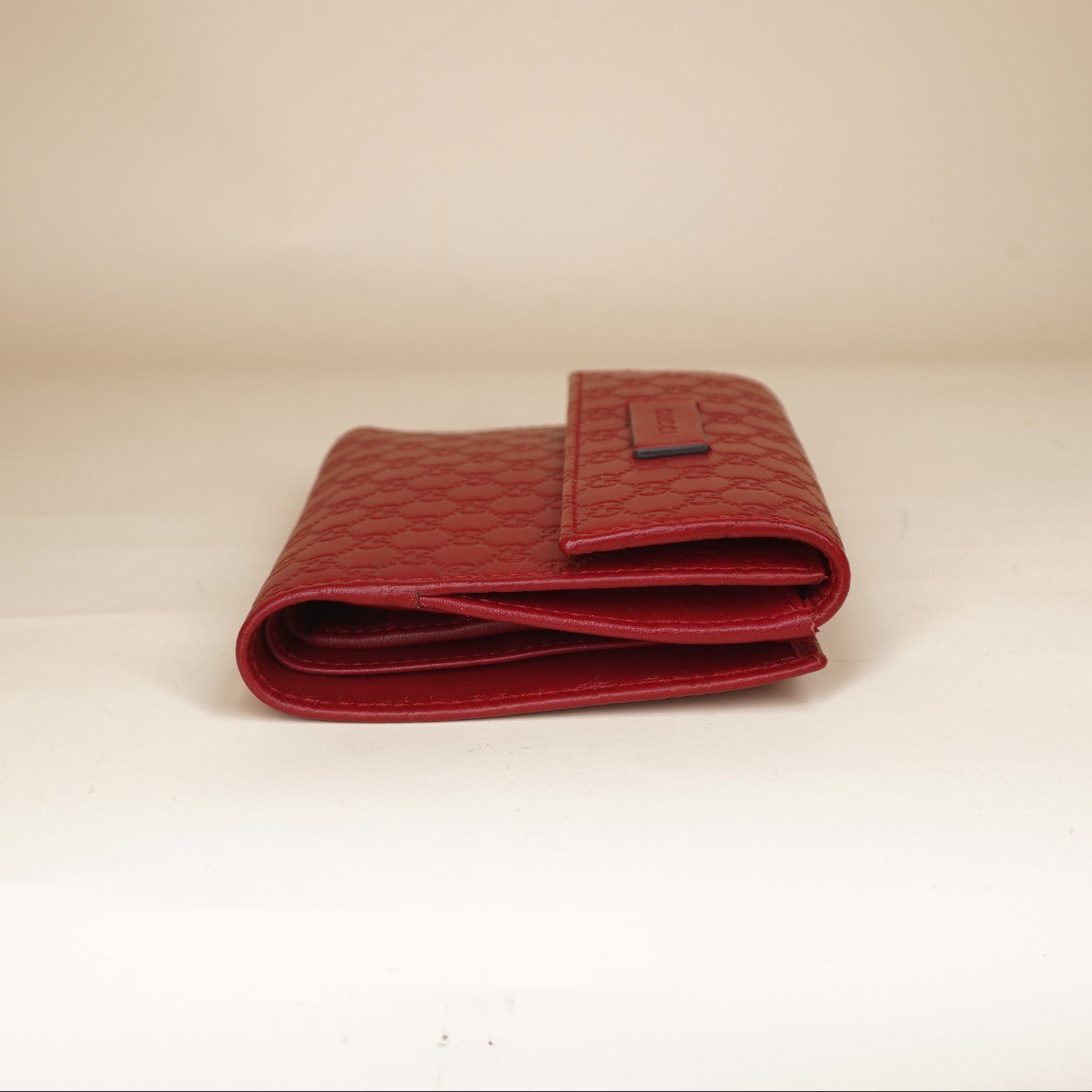 PRE-OWNED GG Microguccissima Red Leather Bi-Fold Wallet