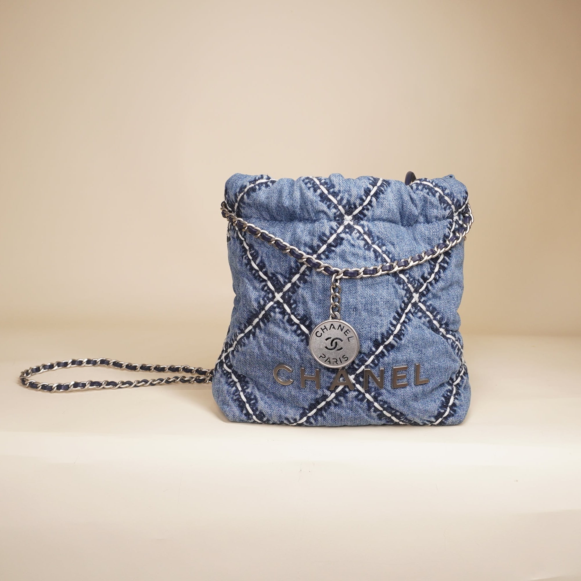 PRE-OWNED Chanel 22 Blue Denim Shoulder Bag