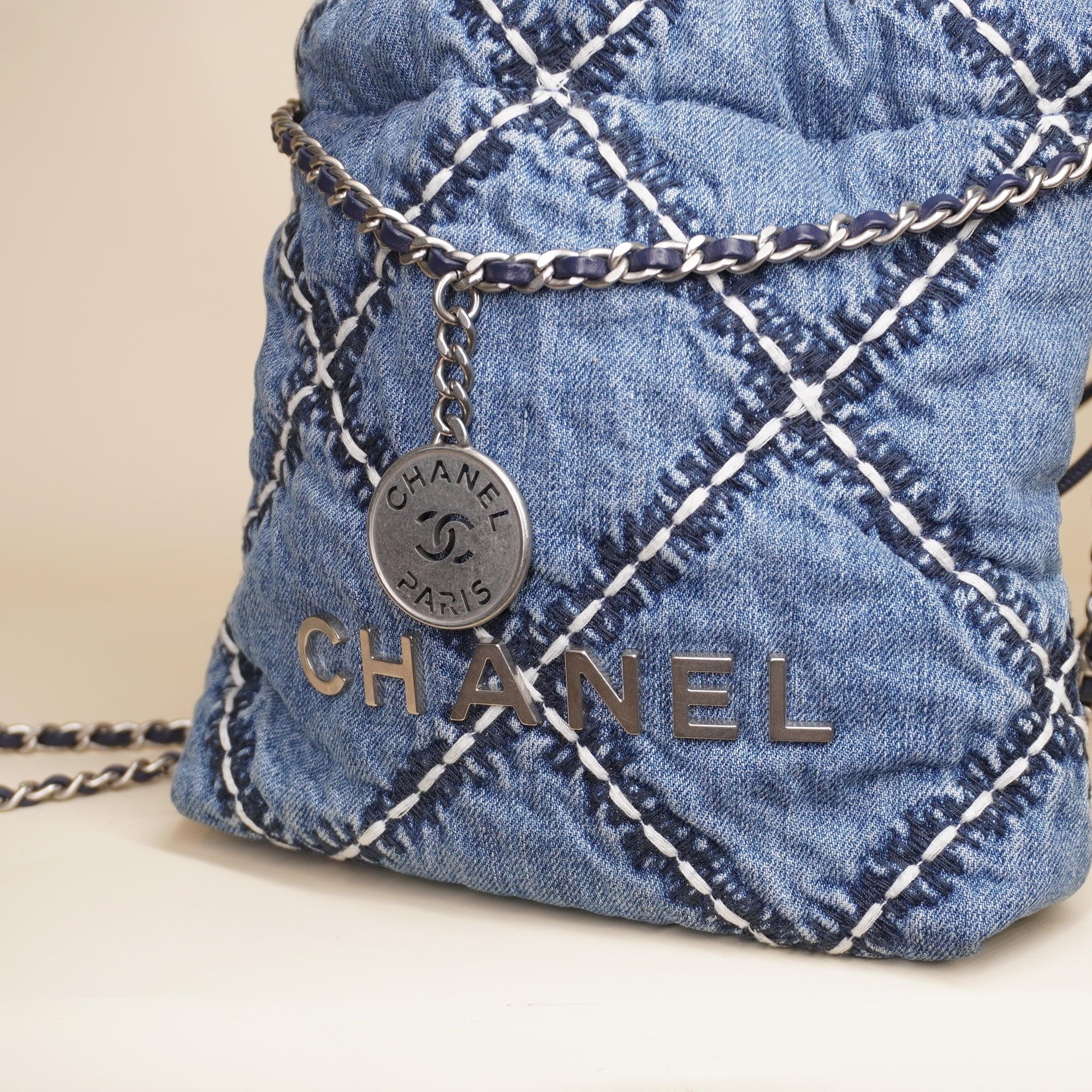 PRE-OWNED Chanel 22 Blue Denim Shoulder Bag