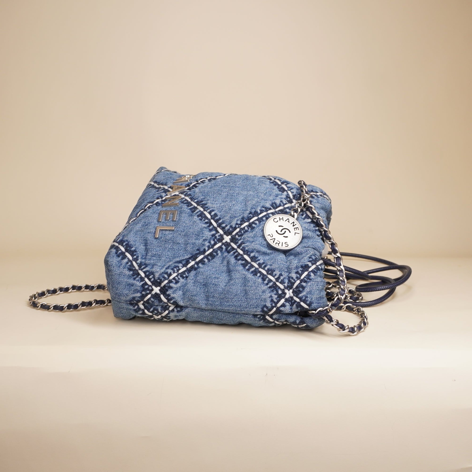 PRE-OWNED Chanel 22 Blue Denim Shoulder Bag