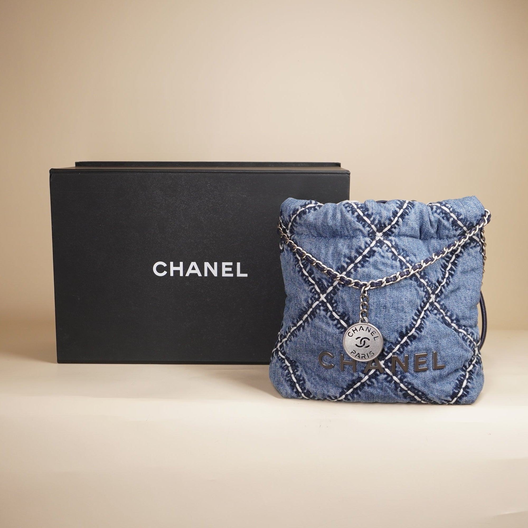 PRE-OWNED Chanel 22 Blue Denim Shoulder Bag