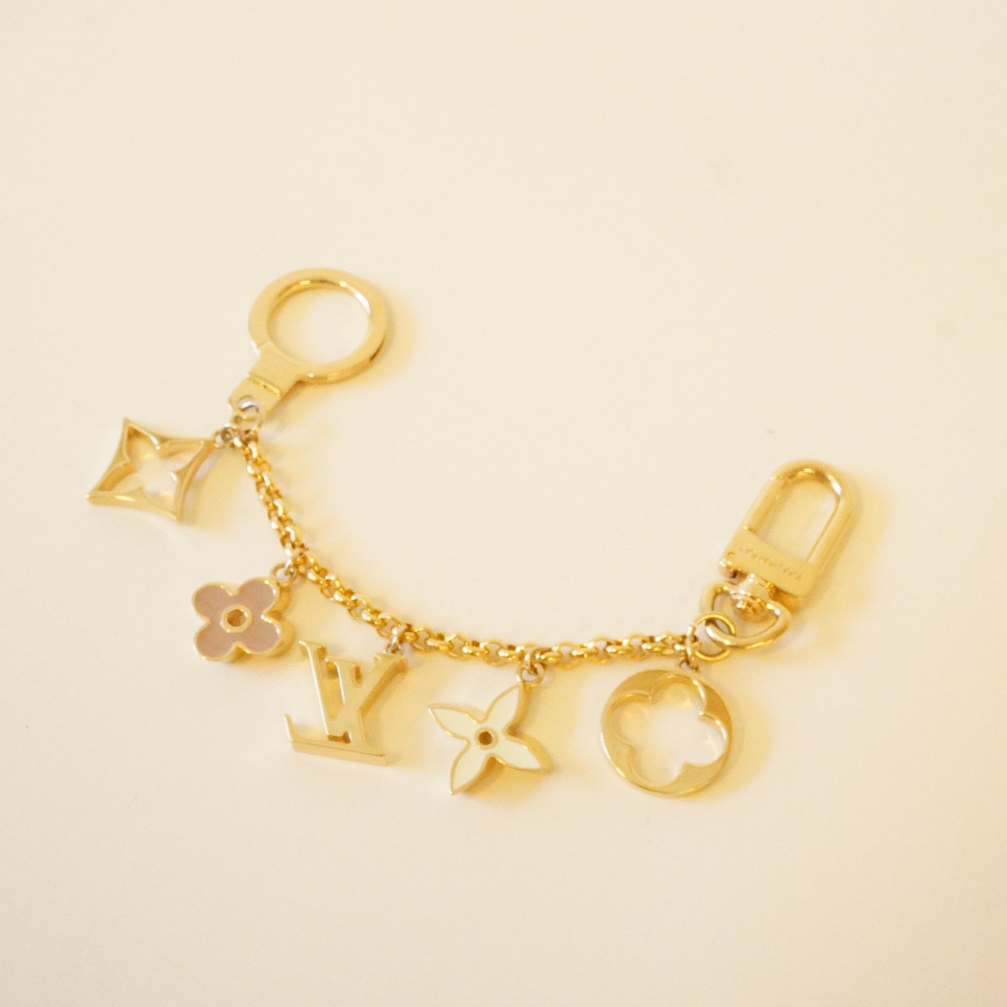 PRE-OWNED LV Gold Chain Brass Enamel Fleur De Monogram Bag Charm