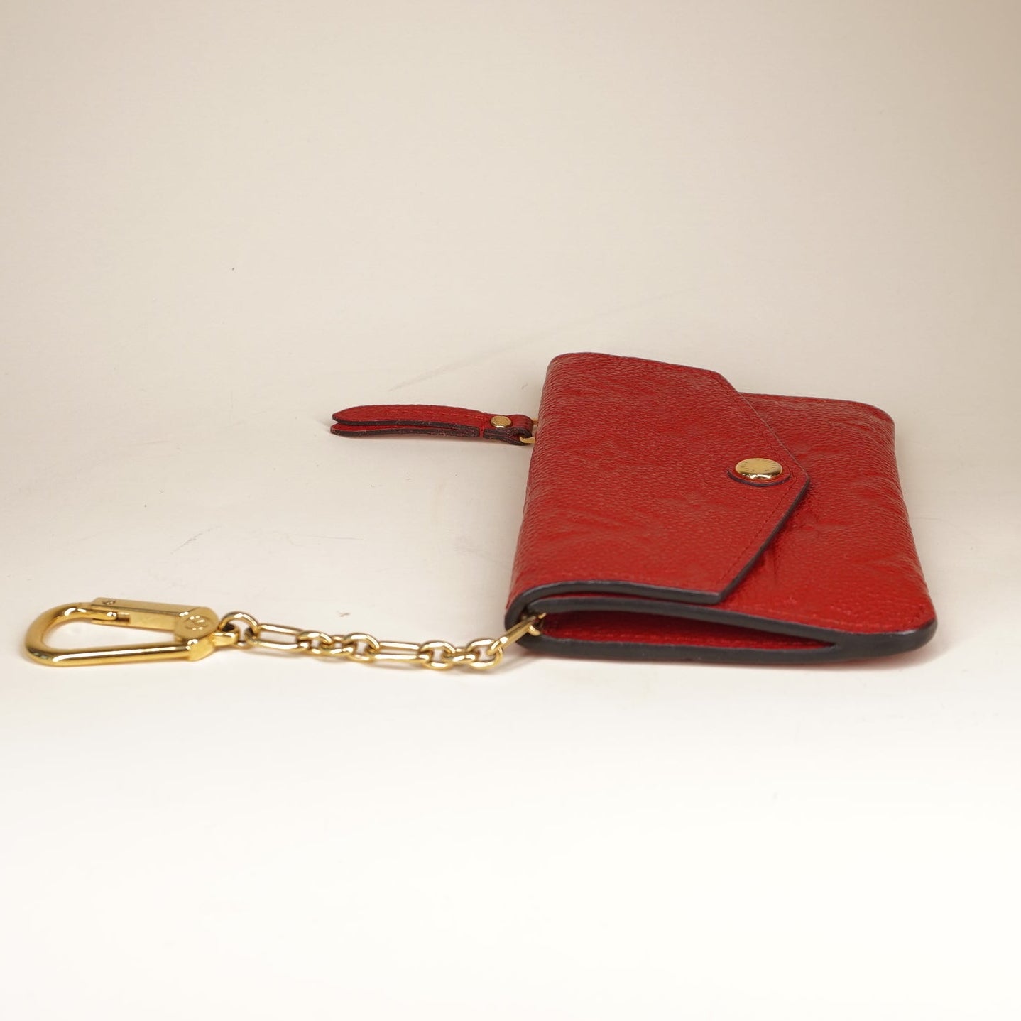 PRE-OWNED LV Red Monogram Empreinte Leather Key Pouch