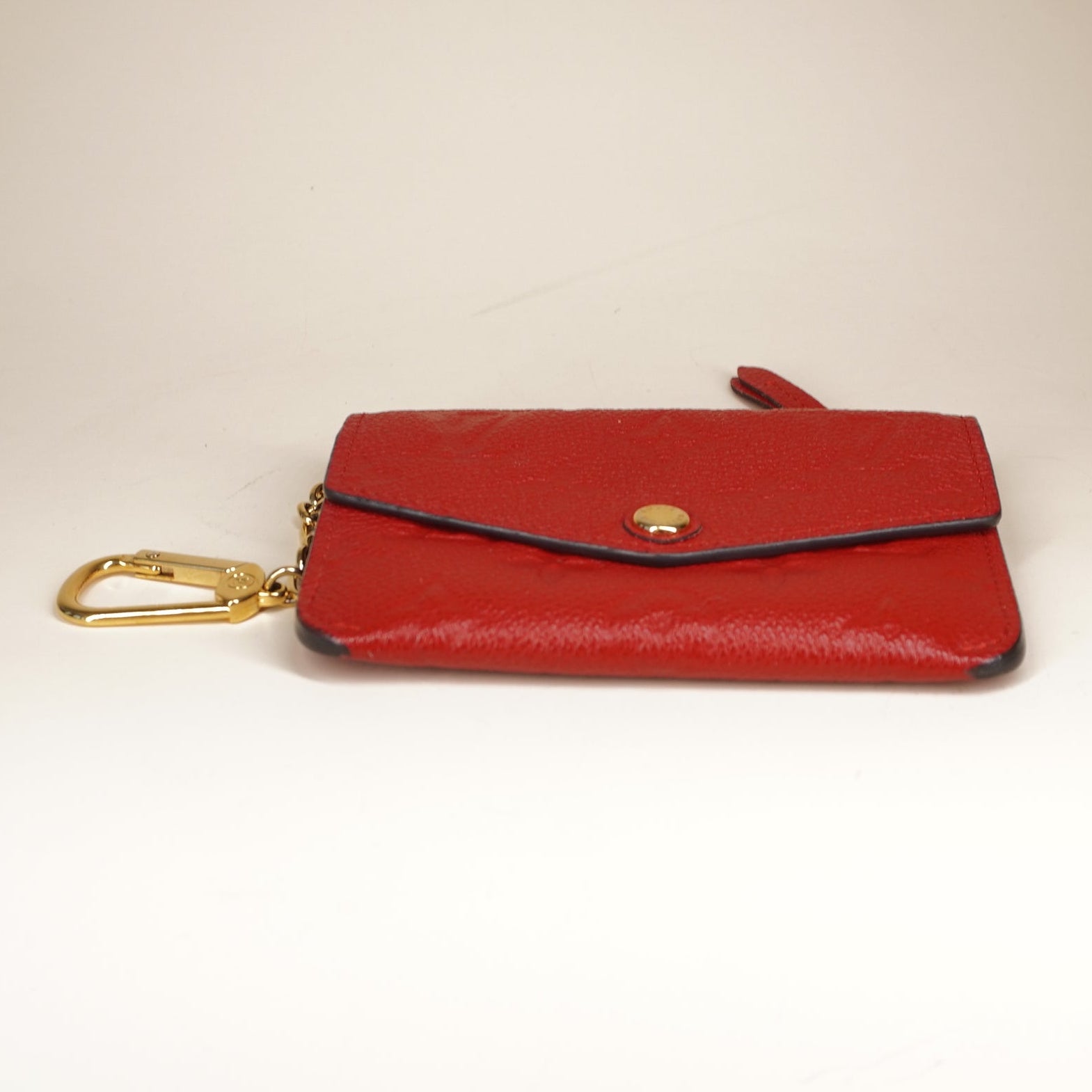 PRE-OWNED LV Red Monogram Empreinte Leather Key Pouch