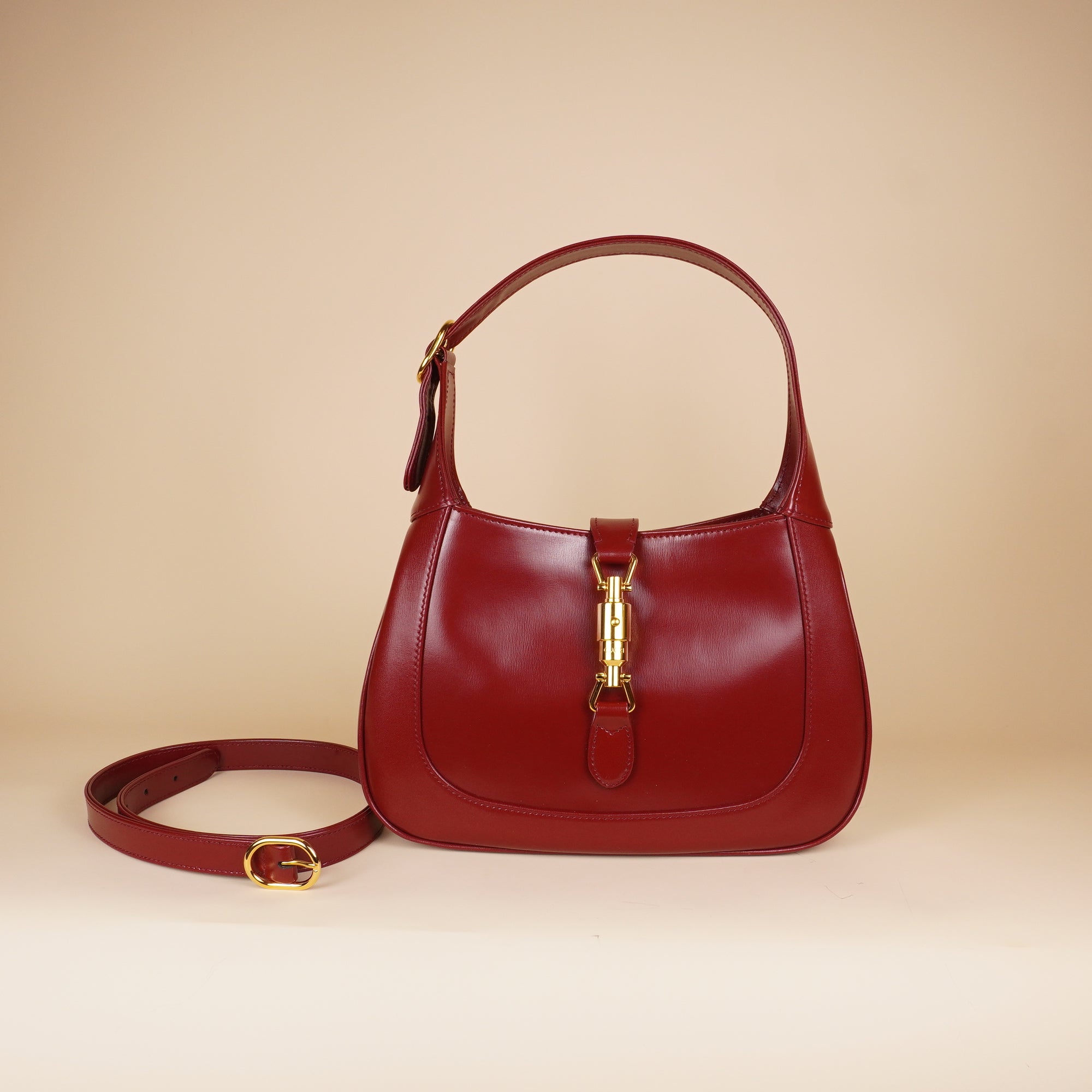 PRE-OWNED GG Boarded Dyana Lux Calfskin Small Jackie 1961 Hobo New Cherry Red with Blue Jackie Charm