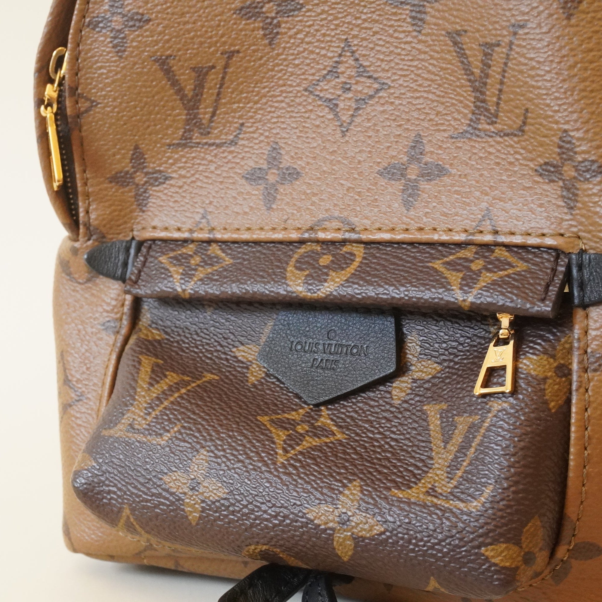 PRE-OWNED LV Monogram Canvas Reverse Mini Palm Spring Backpack