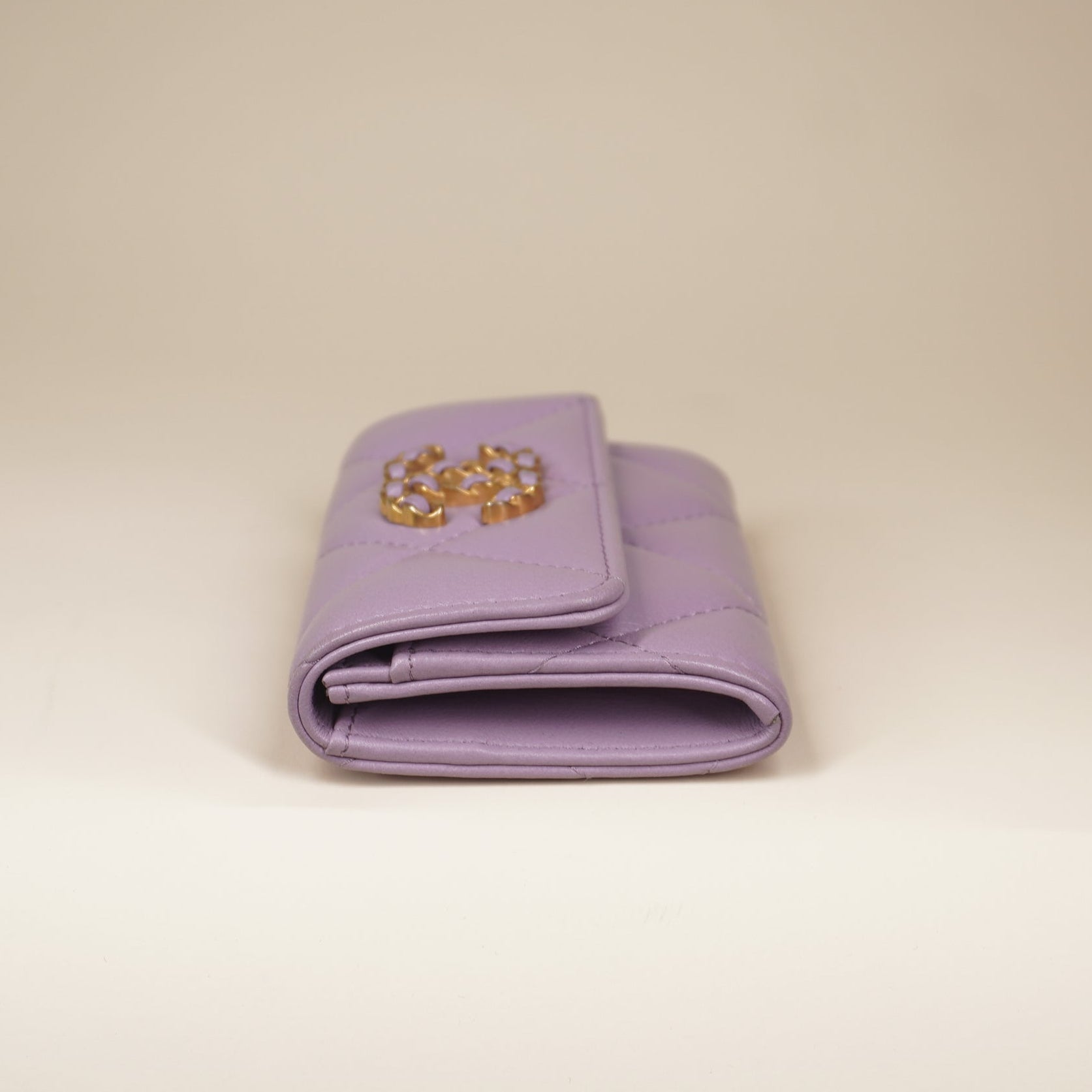 PRE-OWNED CC Lilac Quilted 19 Small Flap Wallet