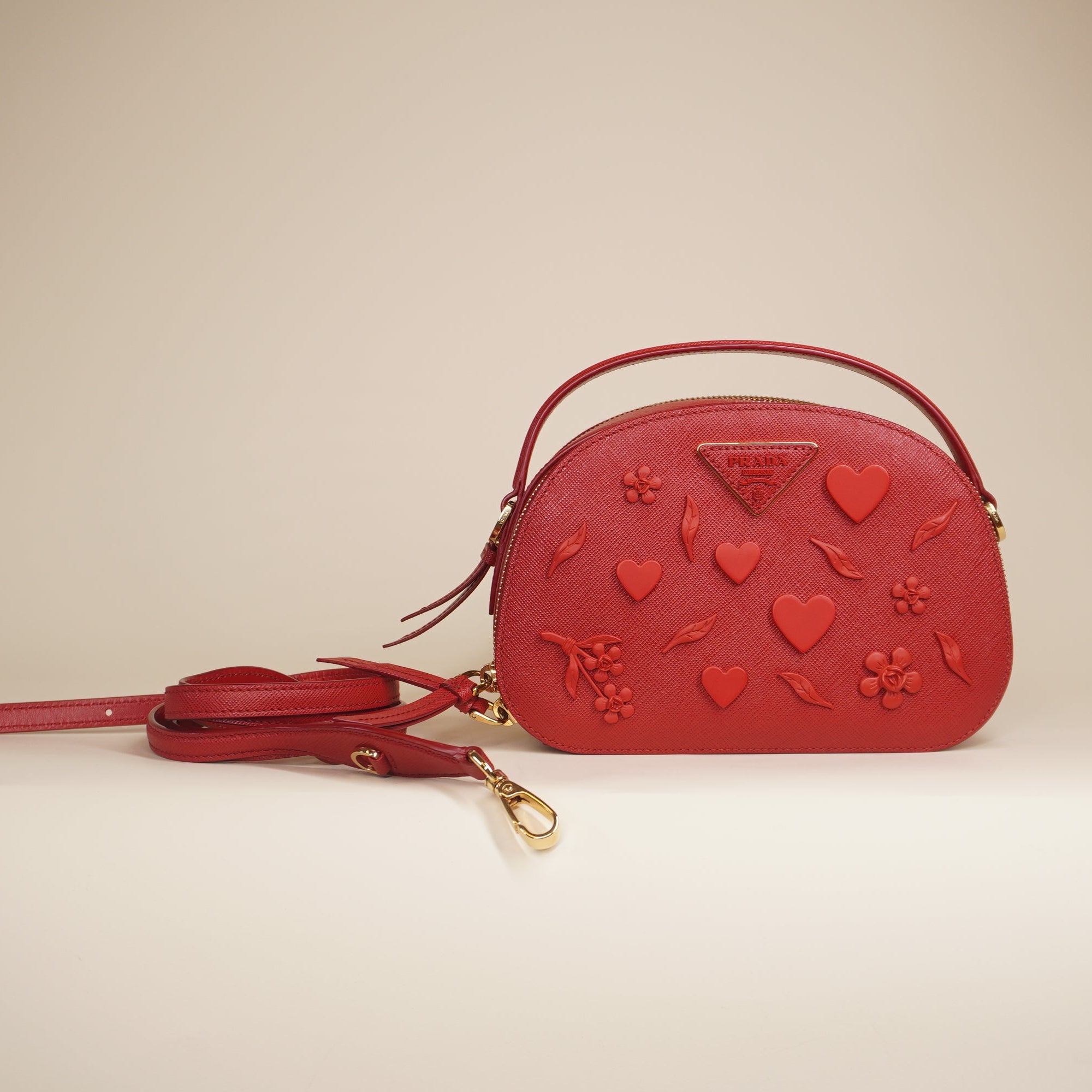PRE-OWNED Saffiano Lux Heart & Flower Odette Crossbody Bag Red