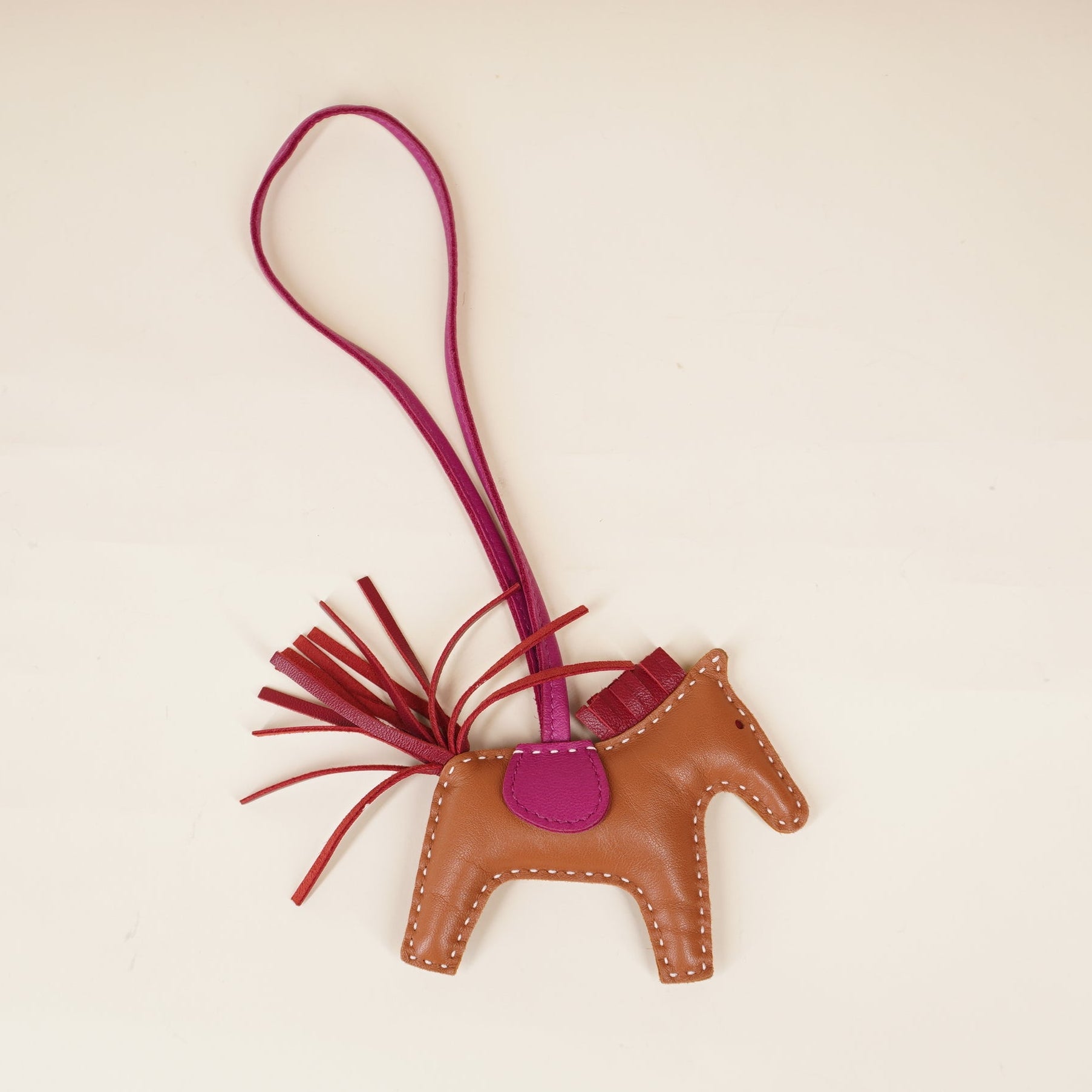 PRE-OWNED Milo Lambskin Grigri Rodeo Horse Bag Charm