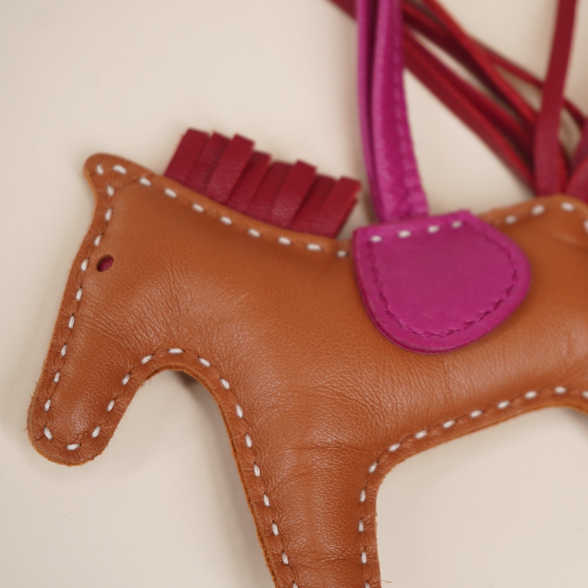 PRE-OWNED Milo Lambskin Grigri Rodeo Horse Bag Charm