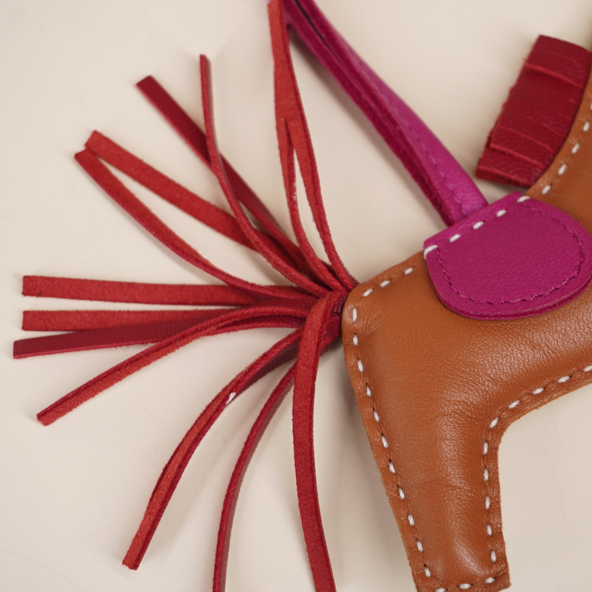 PRE-OWNED Milo Lambskin Grigri Rodeo Horse Bag Charm