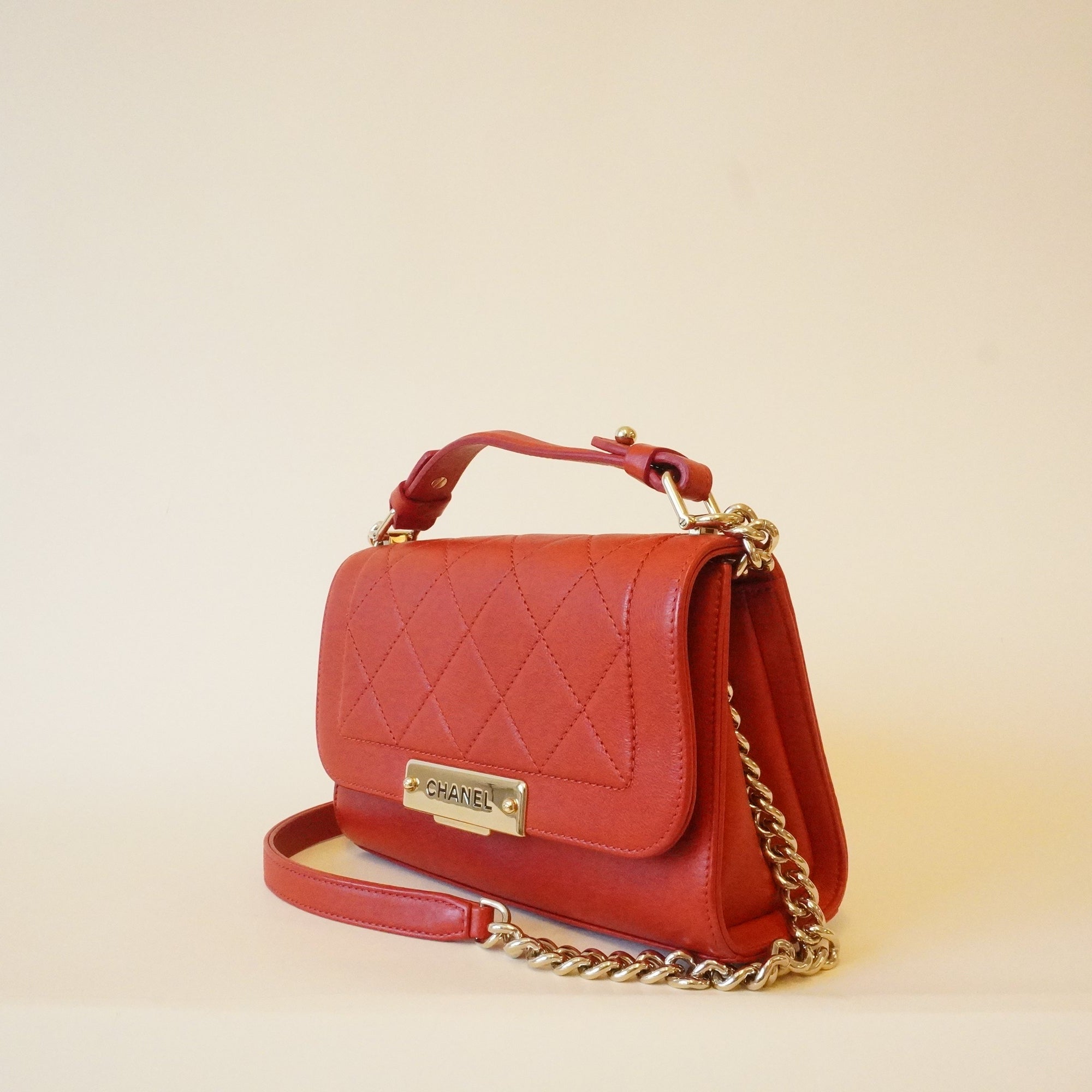 PRE-OWNED CC Red Quilted Calfskin Label Click Flap Shoulder Bag