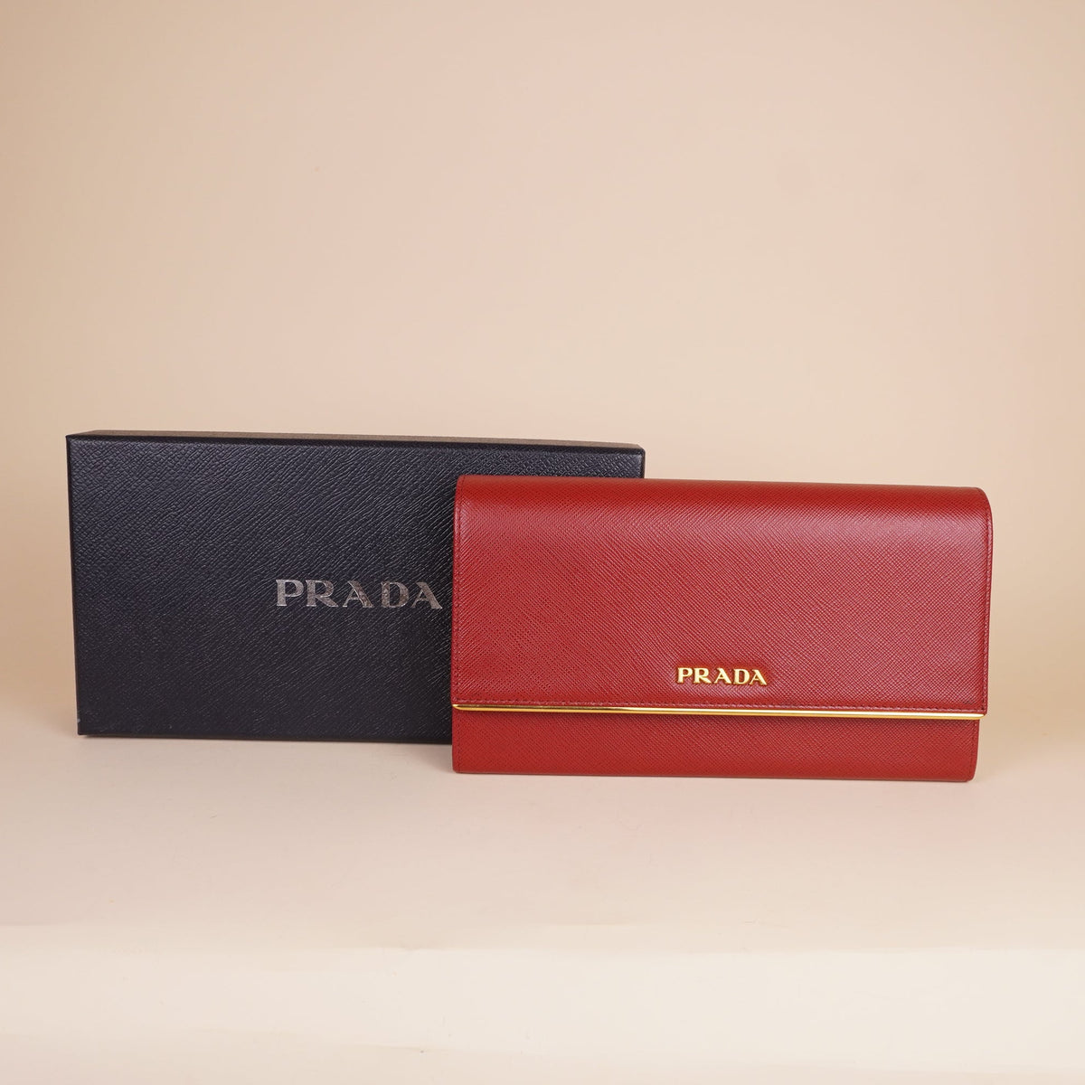 PRE-OWNED Saffiano Metal Continental Flap Wallet Peonia
